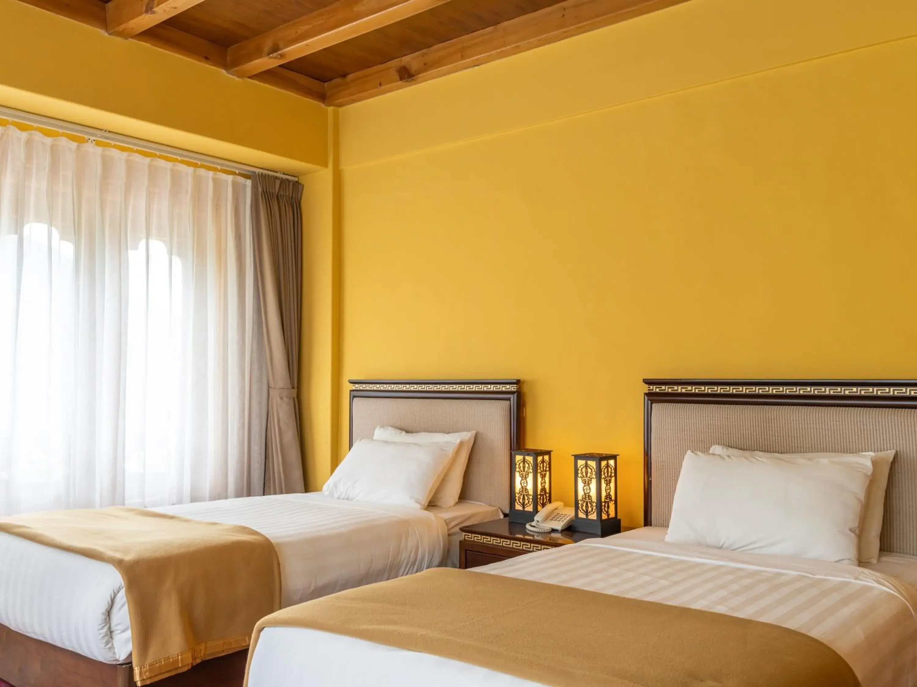 Bed in Tiger's Nest Resort - Best Resort In Paro Bed in Tiger's Nest Resort - Best Resort In Paro