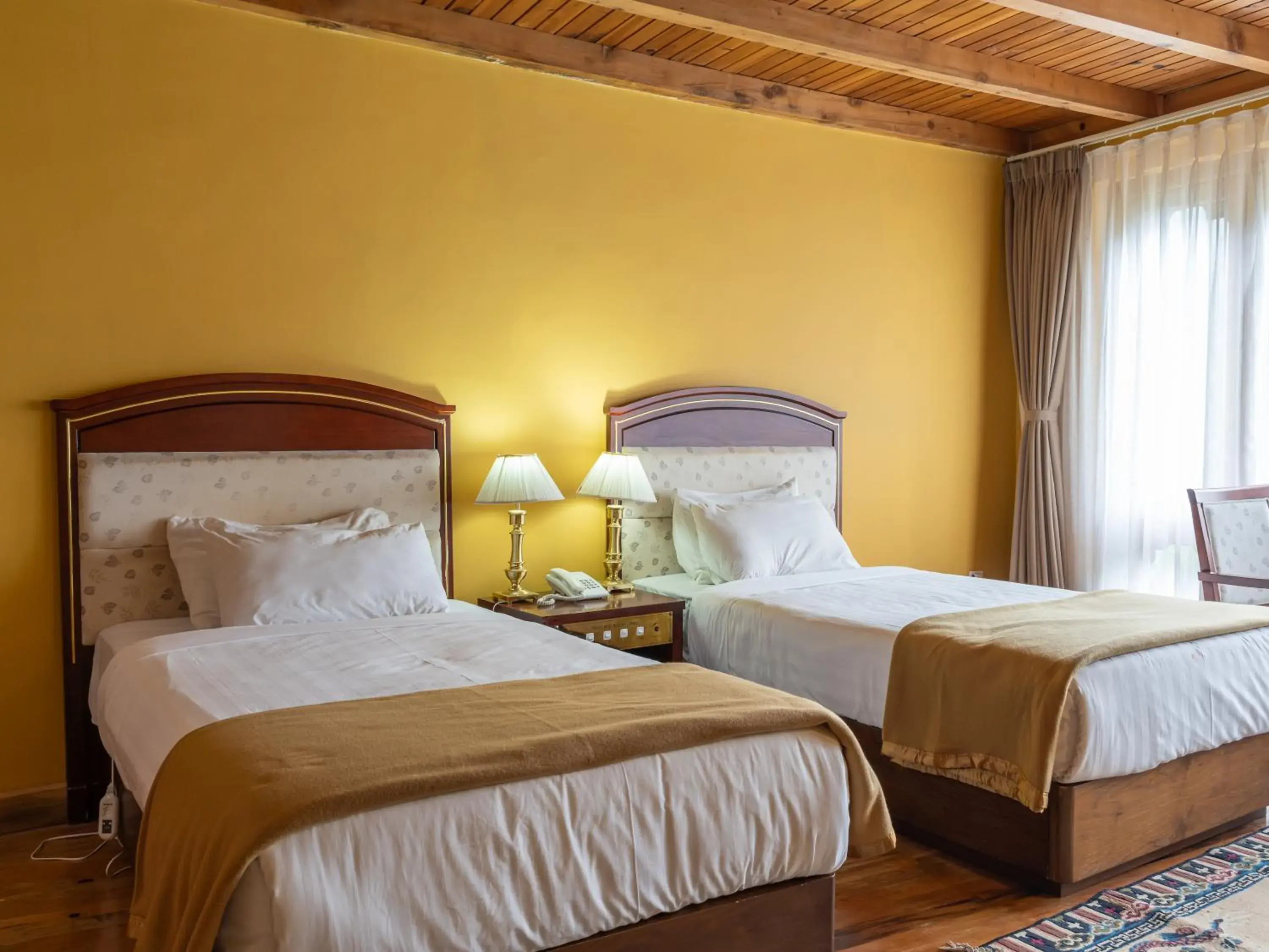 Bed in Tiger's Nest Resort - Best Resort In Paro Bed in Tiger's Nest Resort - Best Resort In Paro