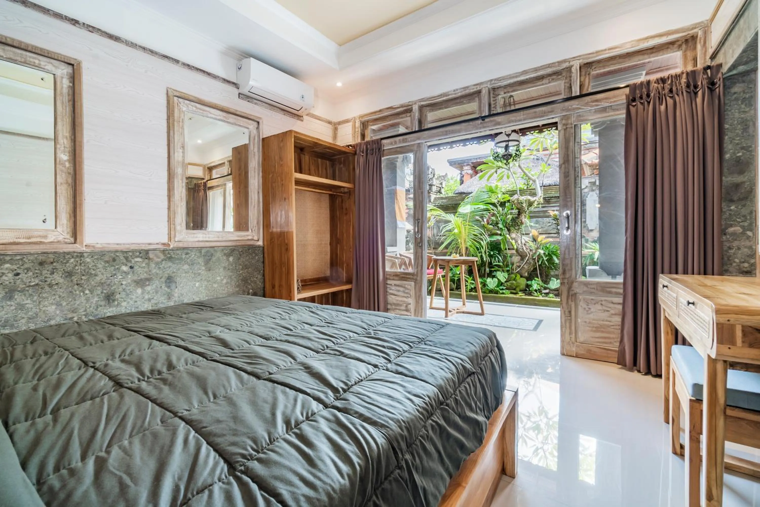 Bed in Indra Homestay Ubud by Luxury Degree