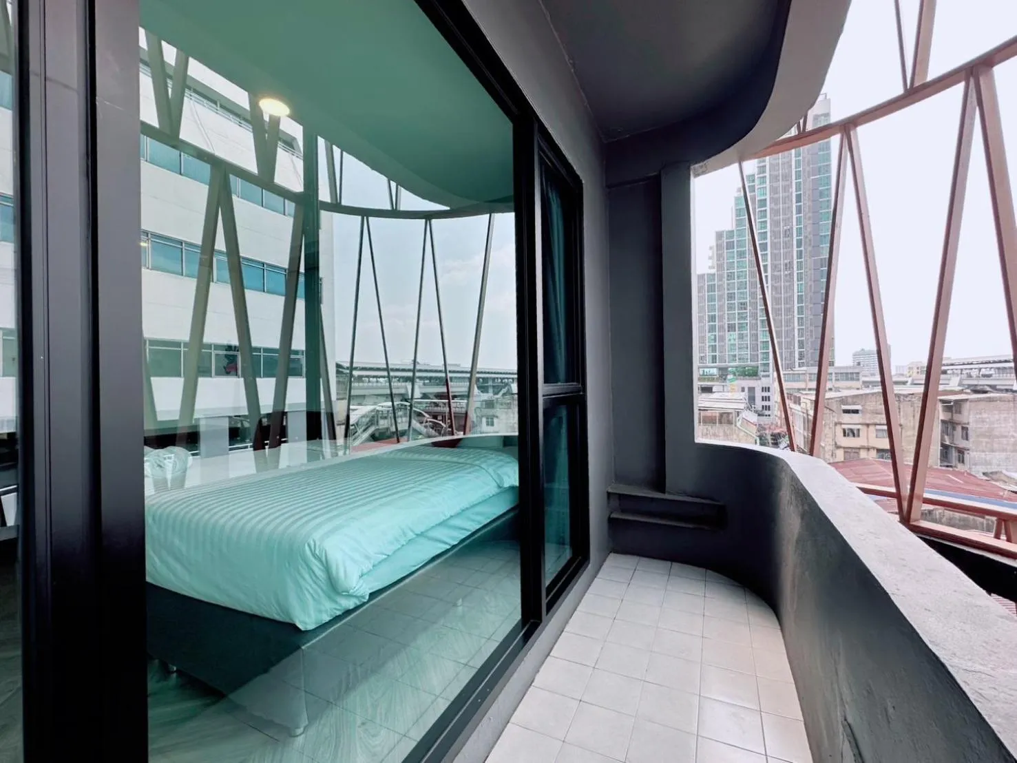 Bed in 14 Sathorn Hotel