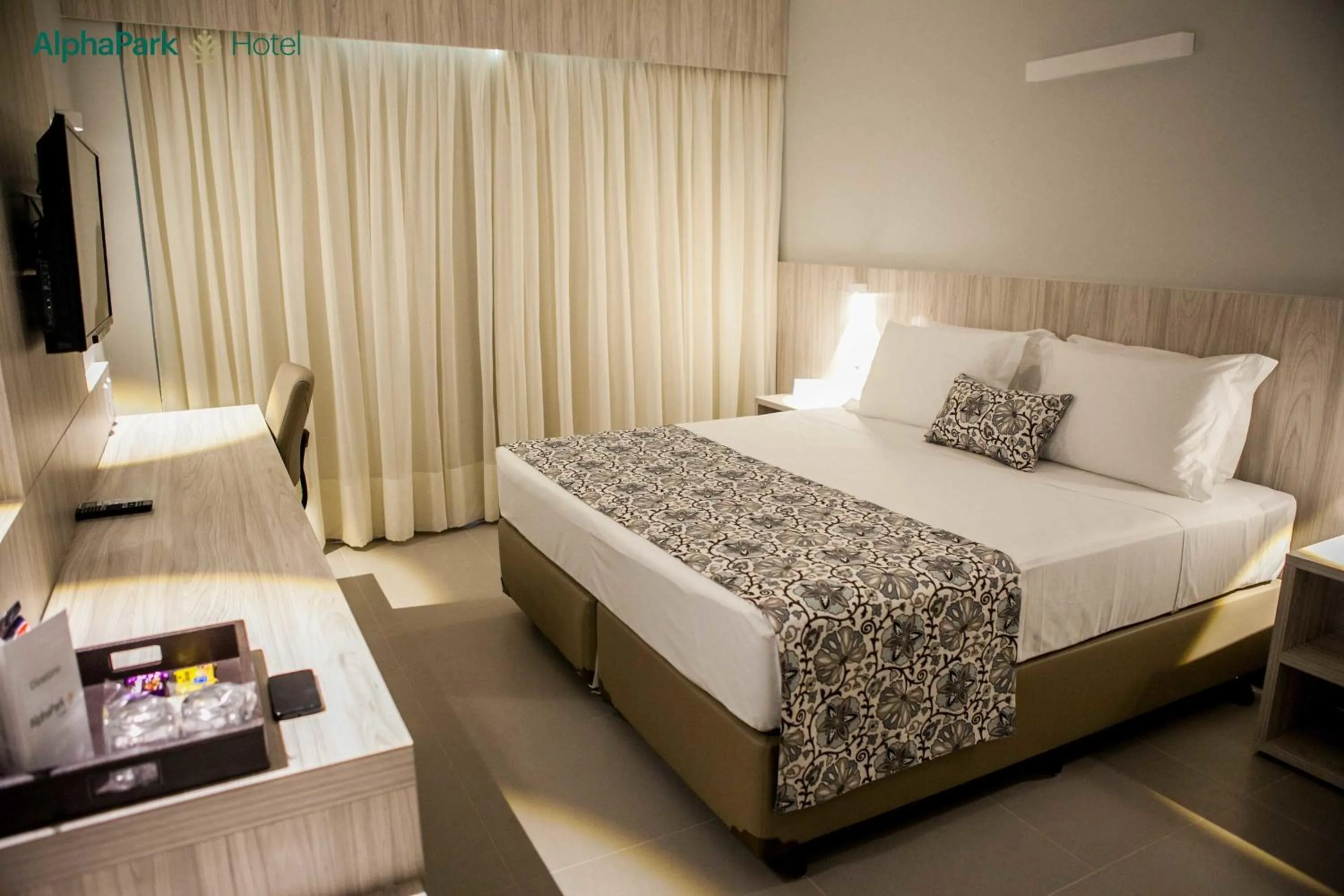 Bed in AlphaPark Hotel