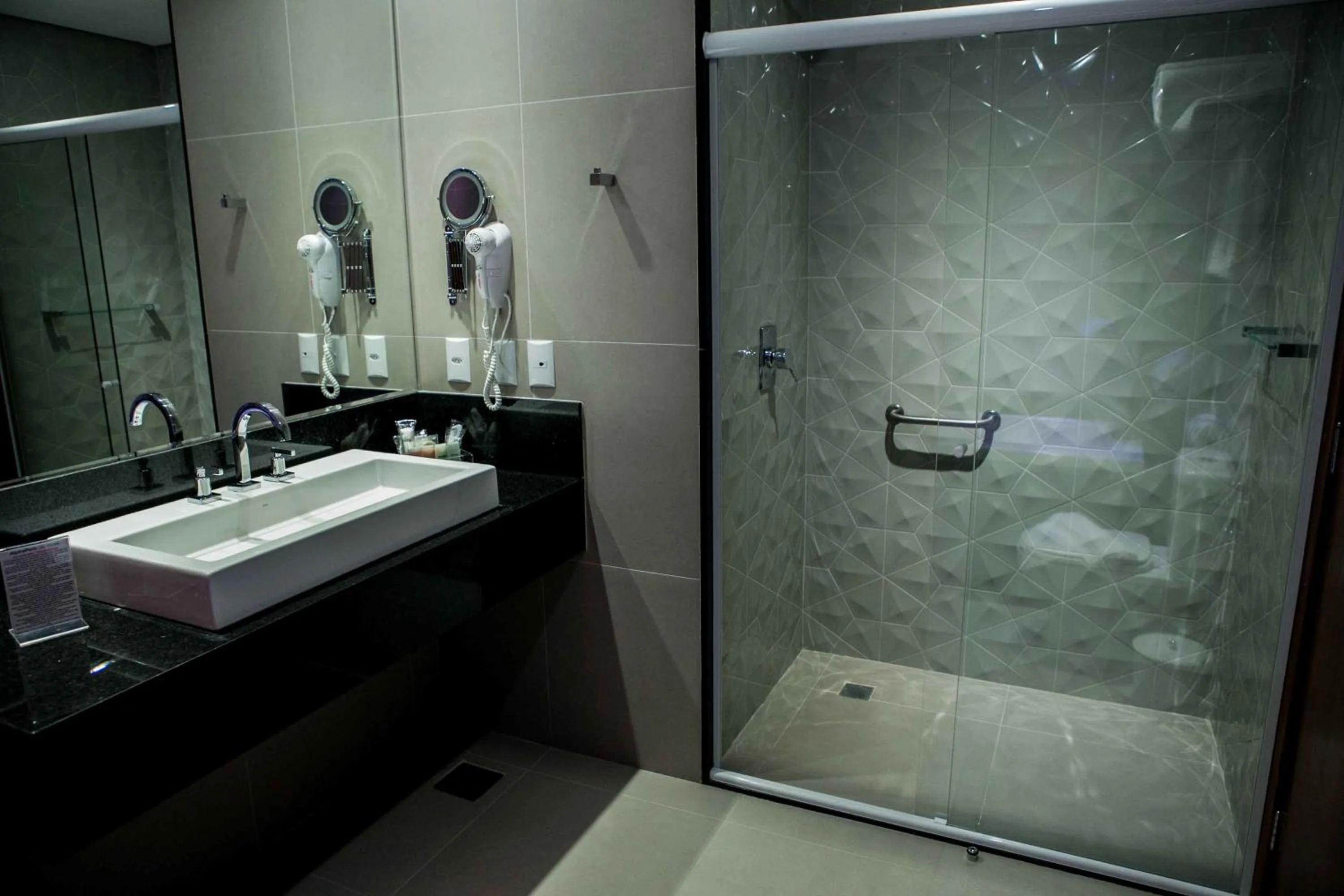 Bathroom in AlphaPark Hotel
