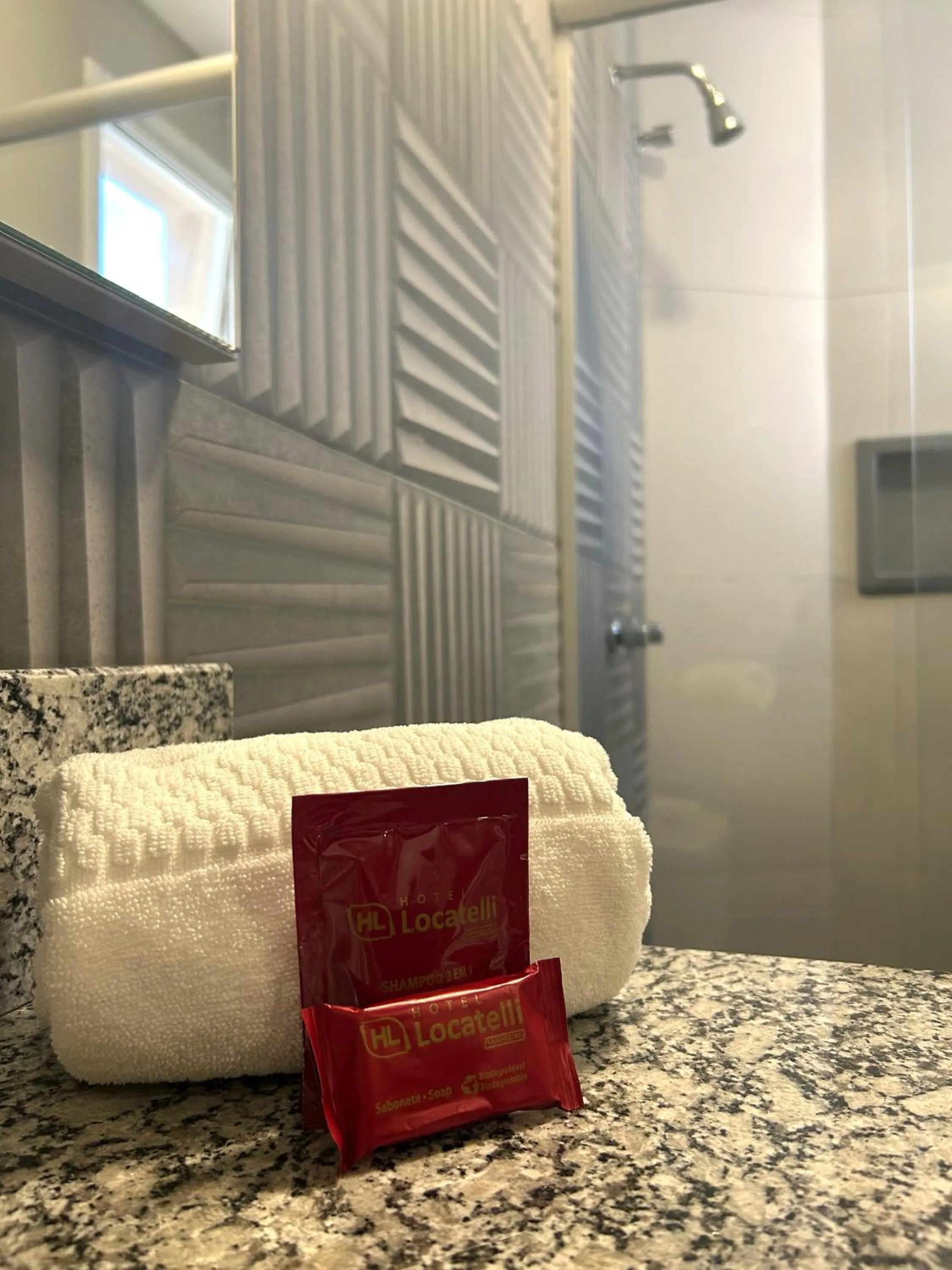 Bathroom in Hotel Locatelli