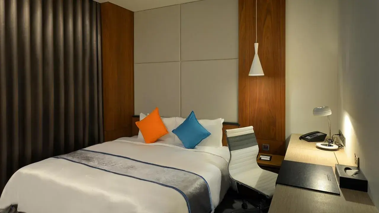 Bed in Golden Tulip Glory Fine Hotel Bed in Golden Tulip Glory Fine Hotel