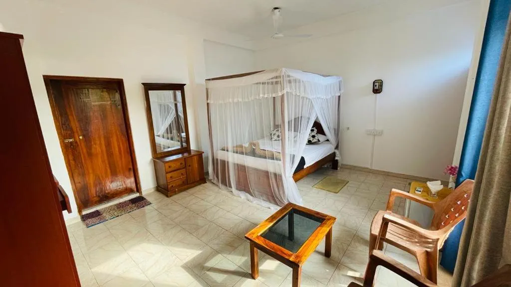 Bed in Sunny Mood Guest House