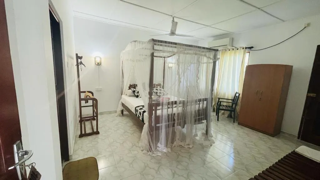 Bed in Sunny Mood Guest House