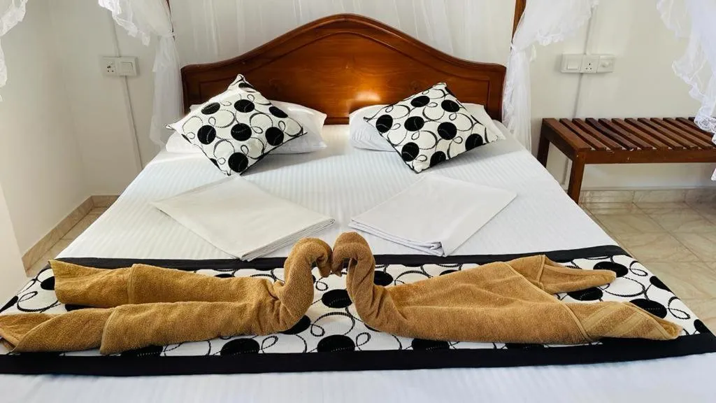 Bed in Sunny Mood Guest House