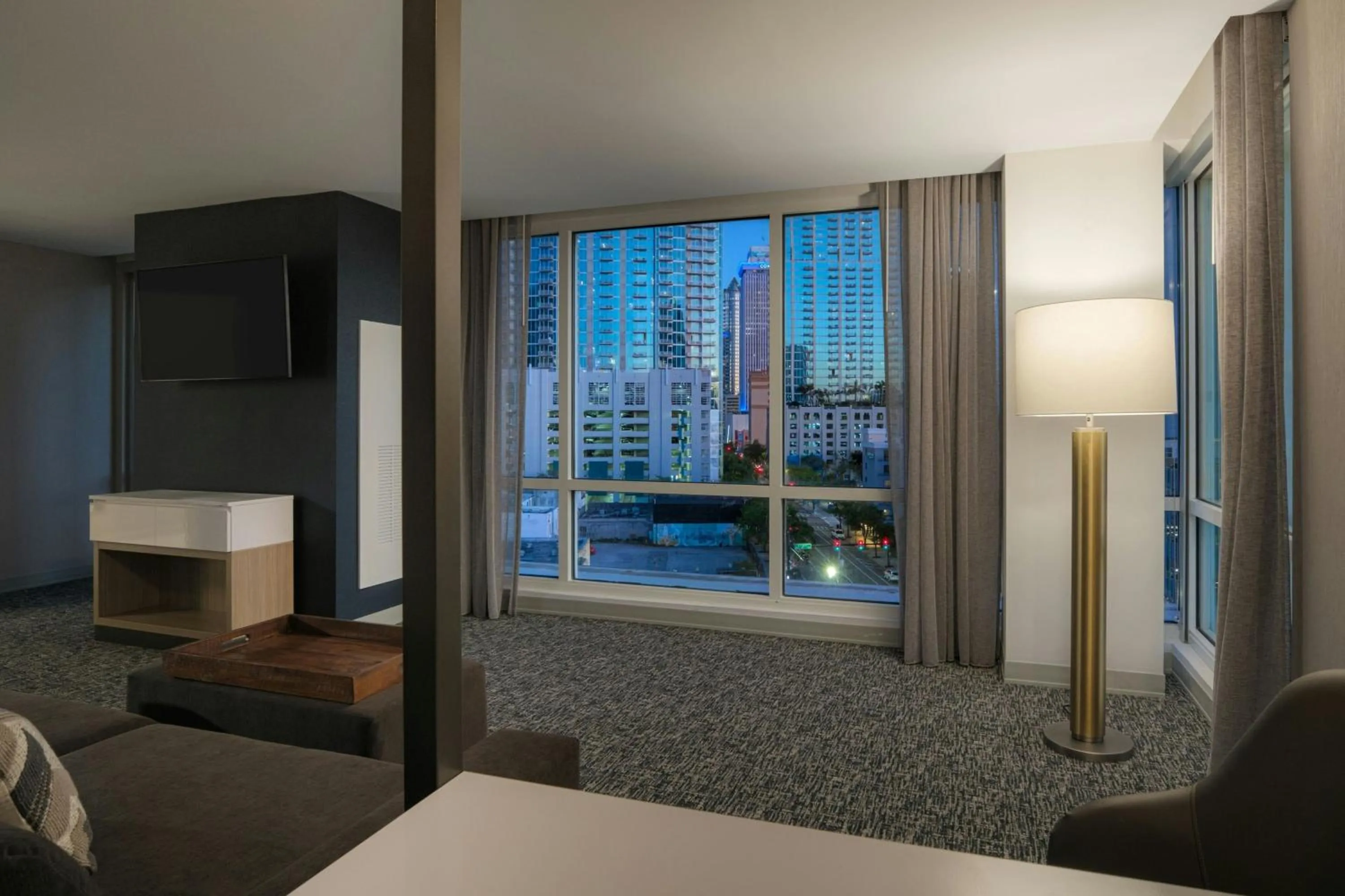 Living room, Bed in SpringHill Suites by Marriott Tampa Downtown