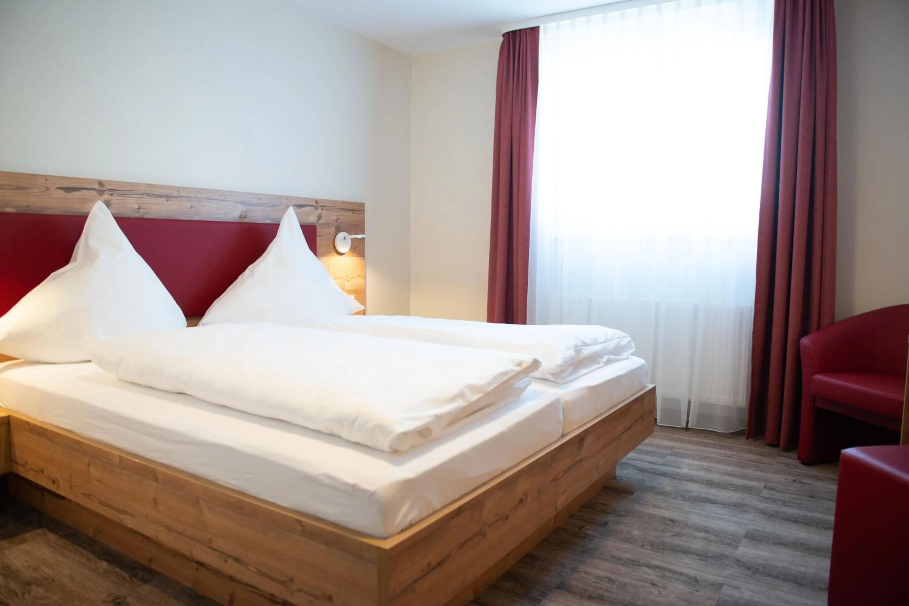 Photo of the whole room, Bed in Gasthaus Stroh