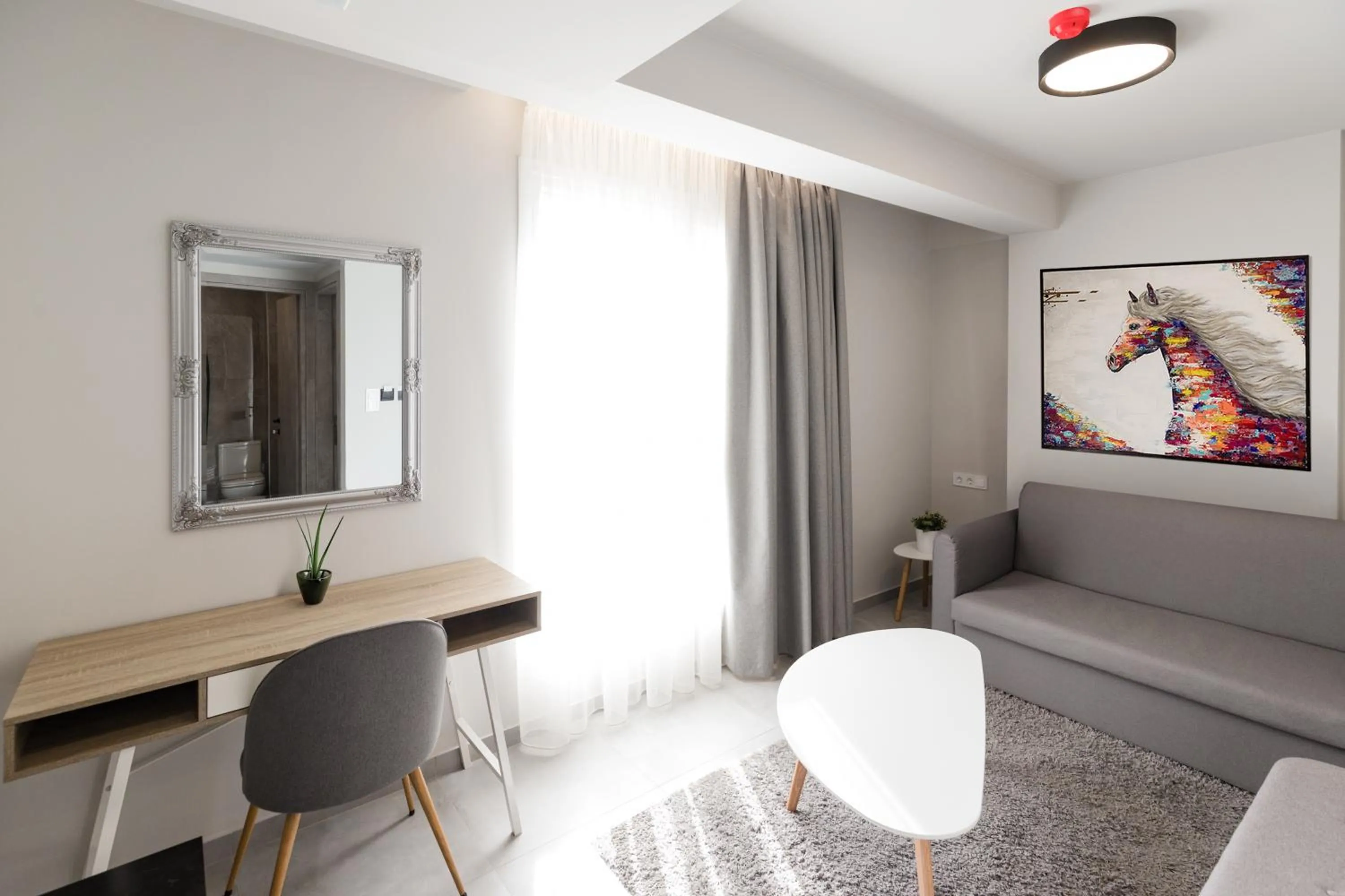 Living room in Comfort City Suites & Rooms