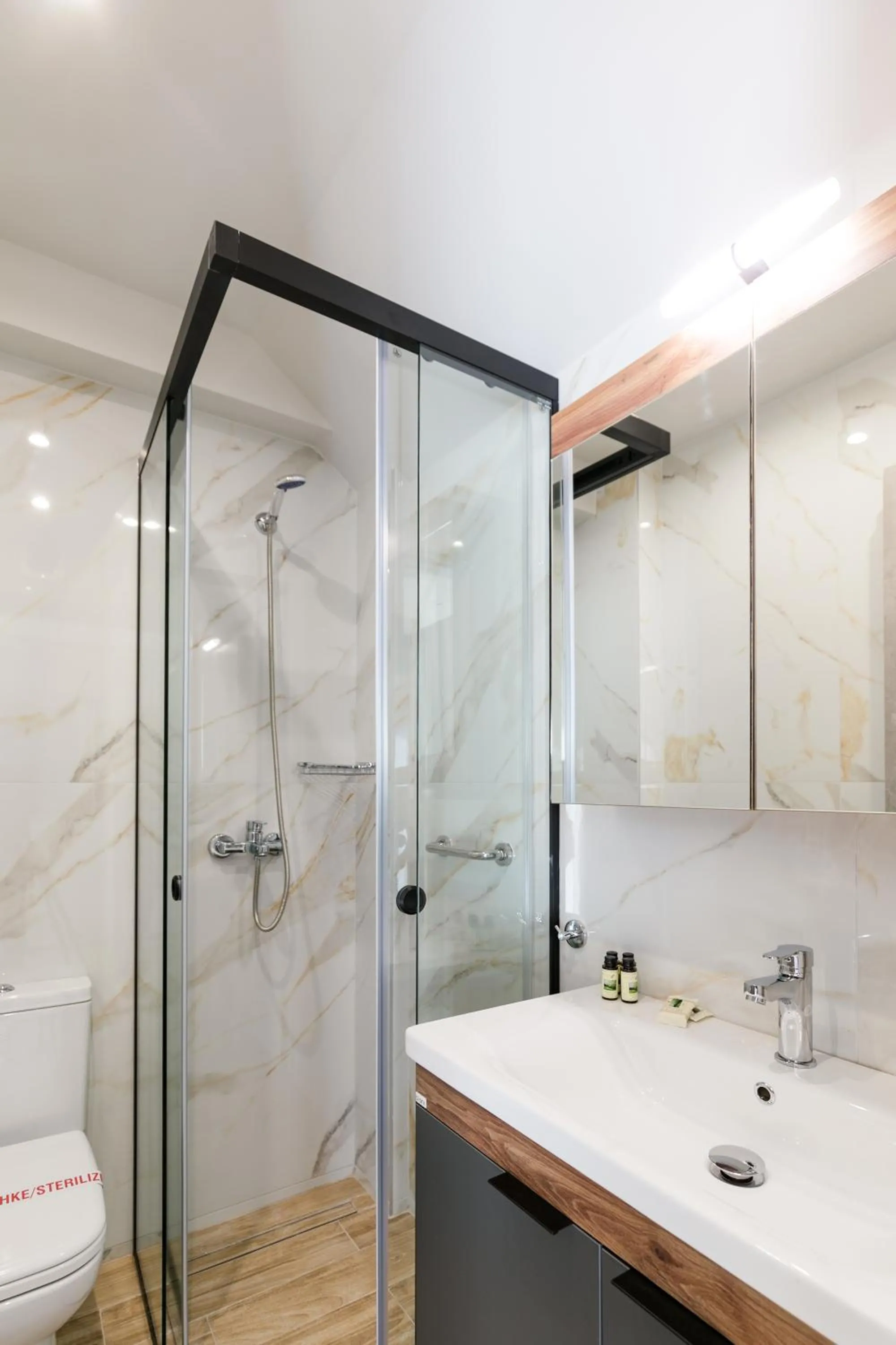 Bathroom in Comfort City Suites & Rooms