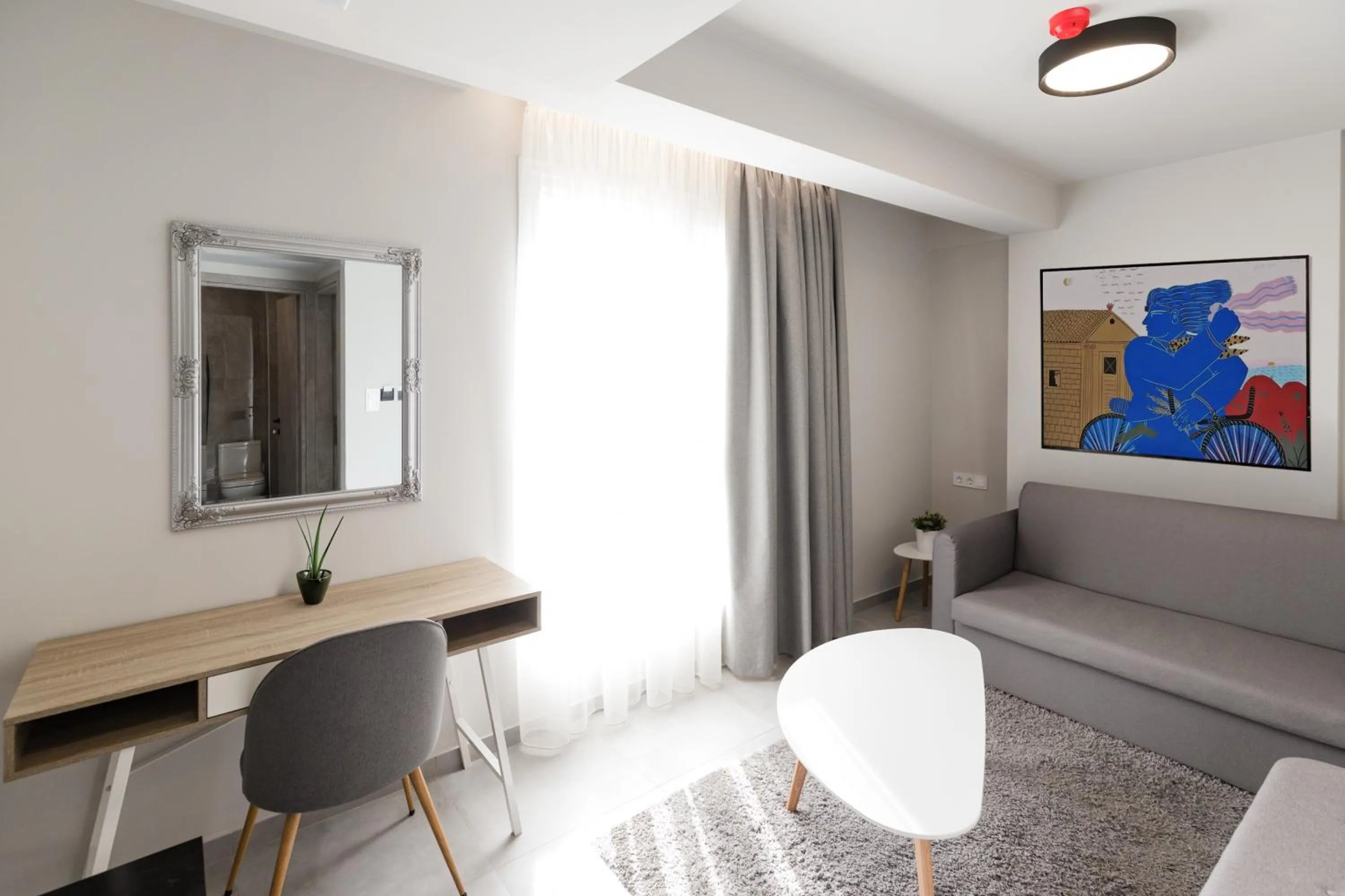 Living room in Comfort City Suites & Rooms