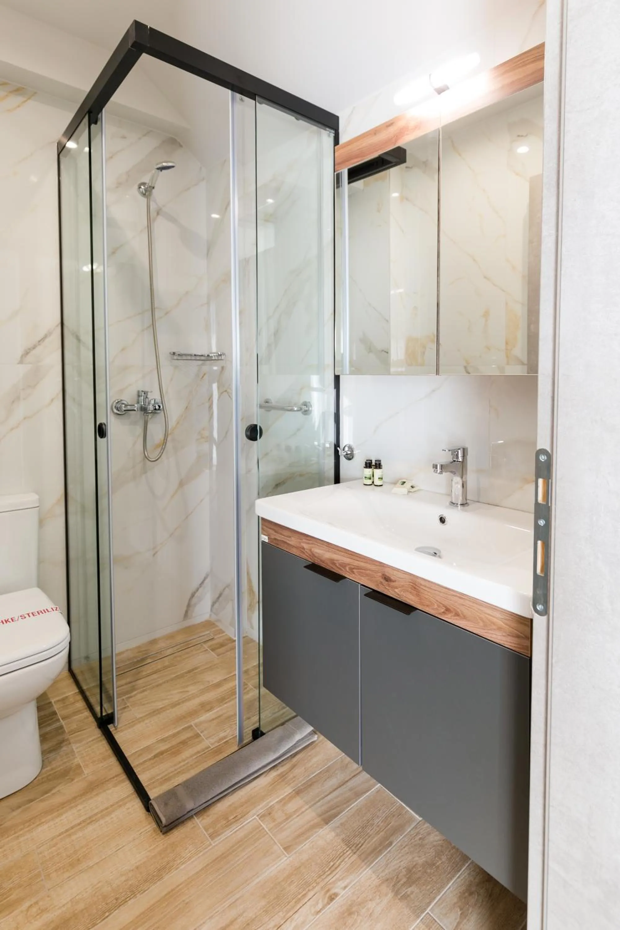 Bathroom in Comfort City Suites & Rooms