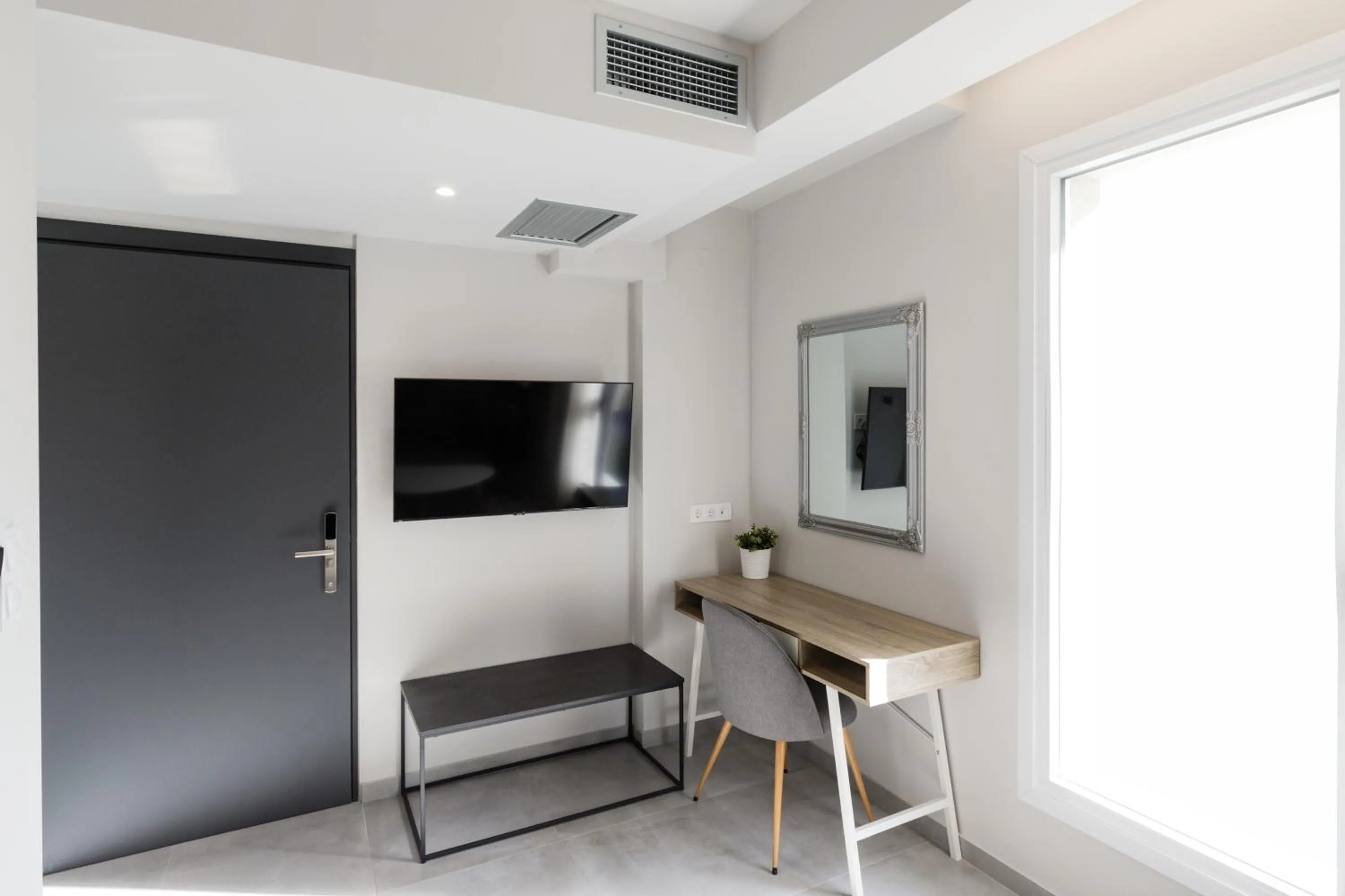 TV and multimedia in Comfort City Suites & Rooms