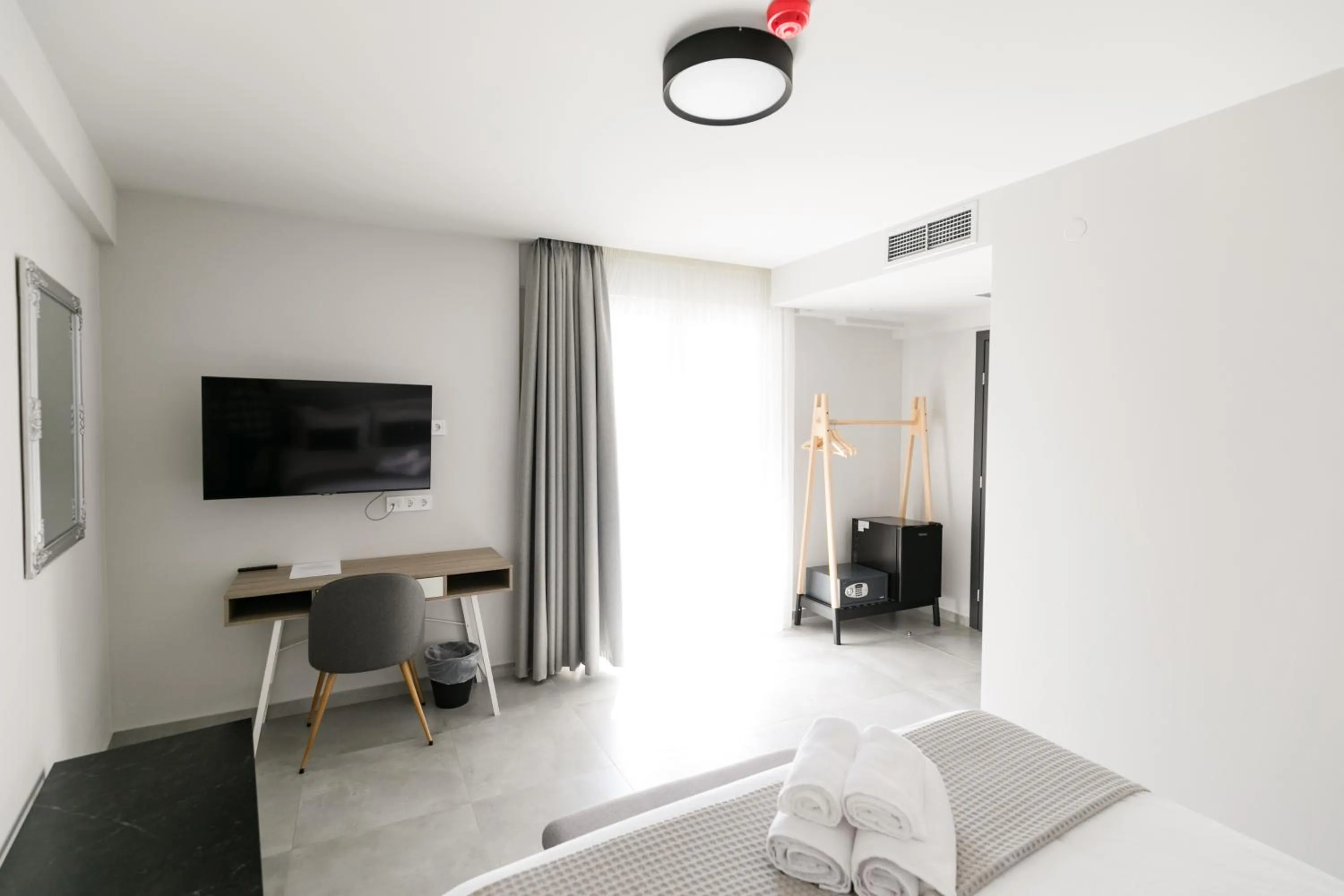 Bed in Comfort City Suites & Rooms