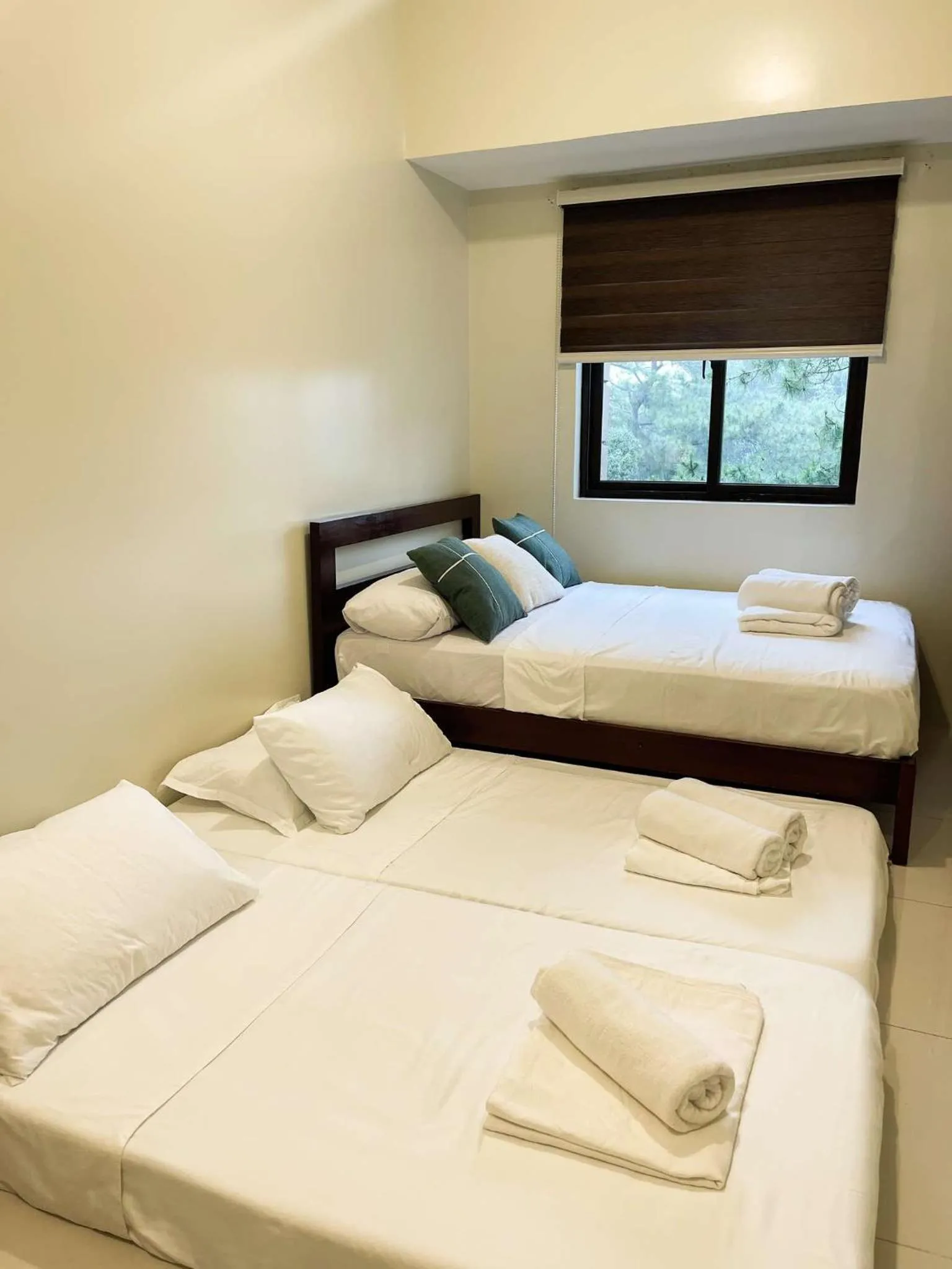 Bed in Cozy Pine Suites