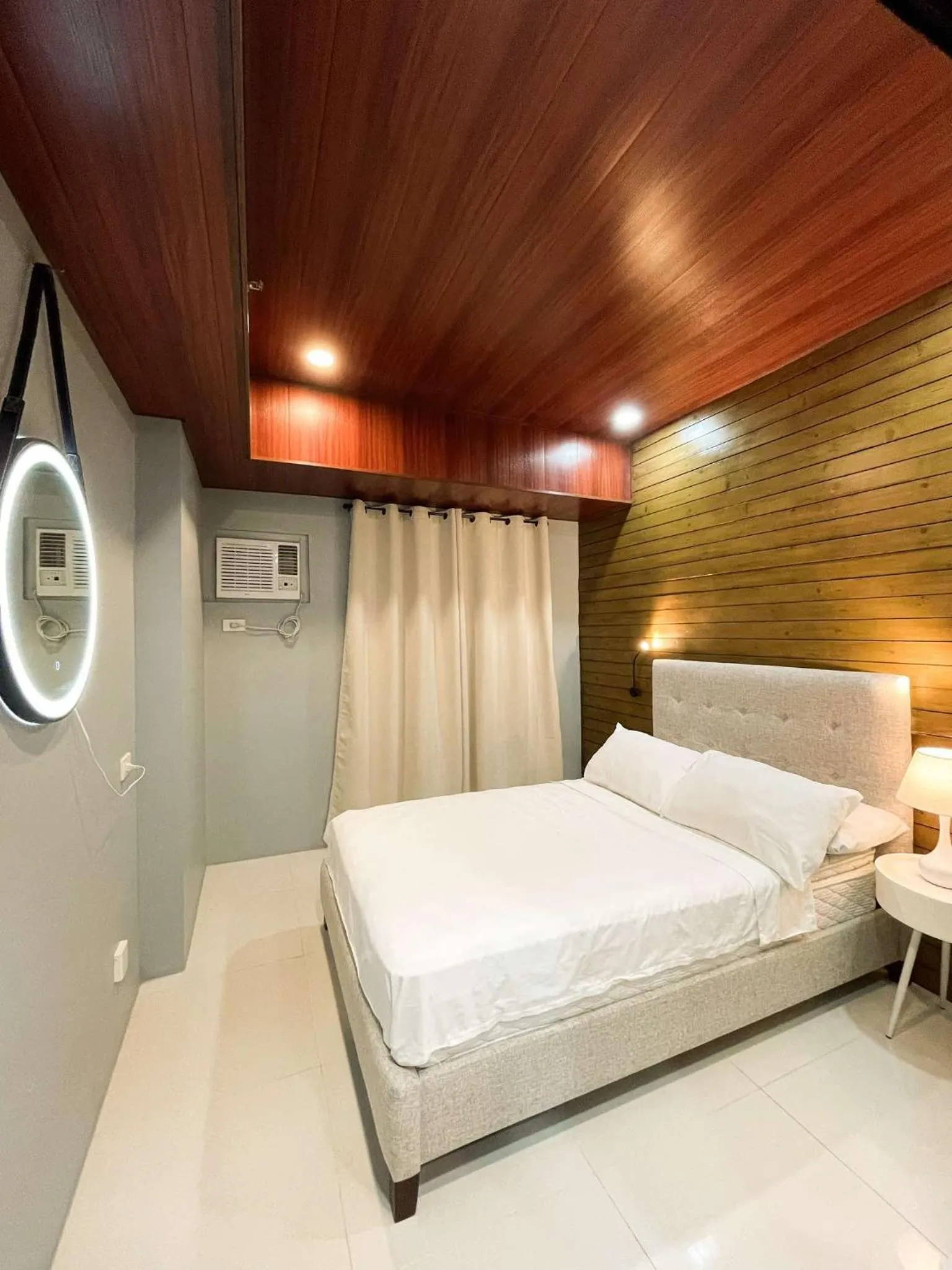 Bed in Cozy Pine Suites