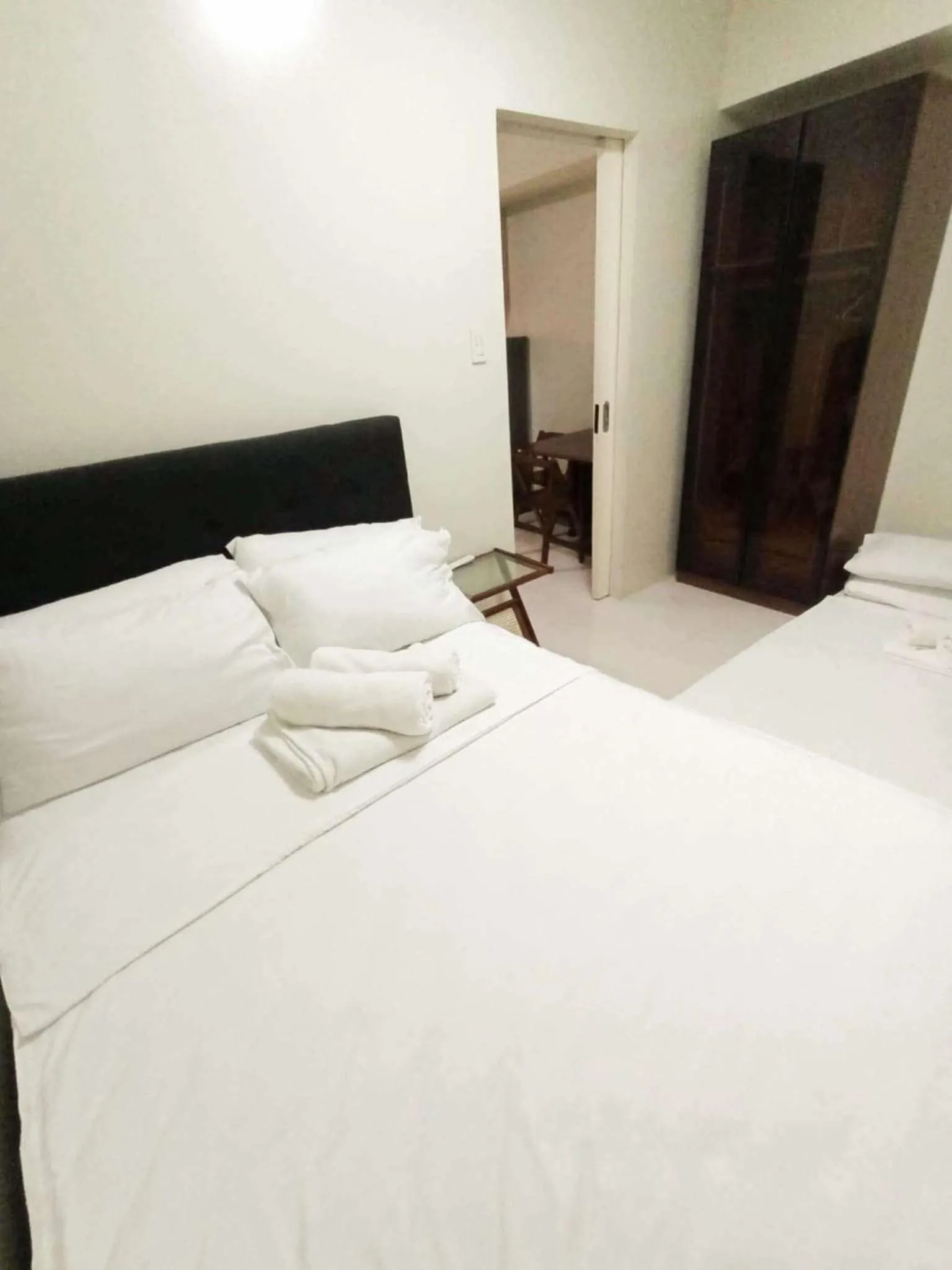 Bed in Cozy Pine Suites