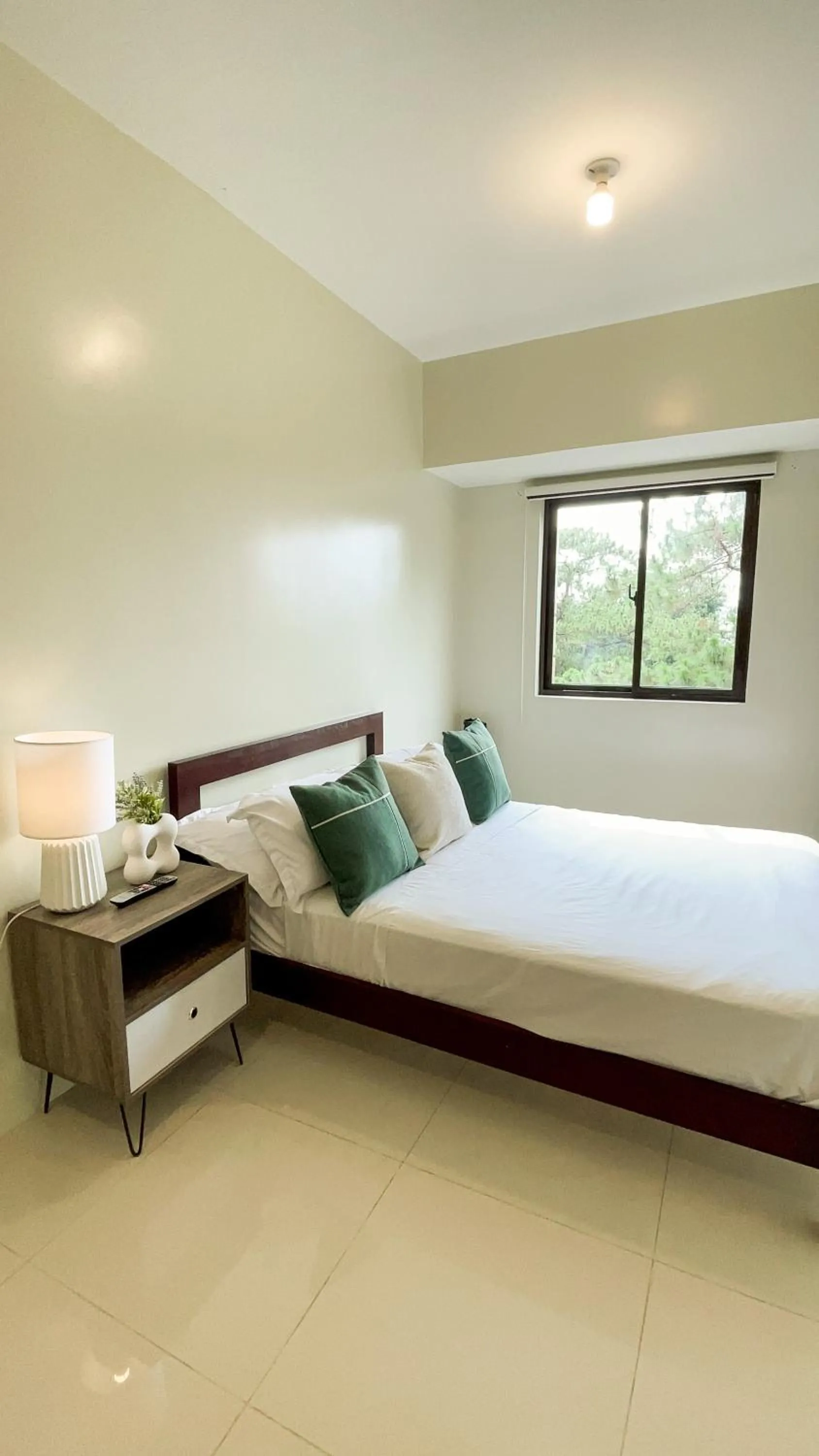 Bed in Cozy Pine Suites