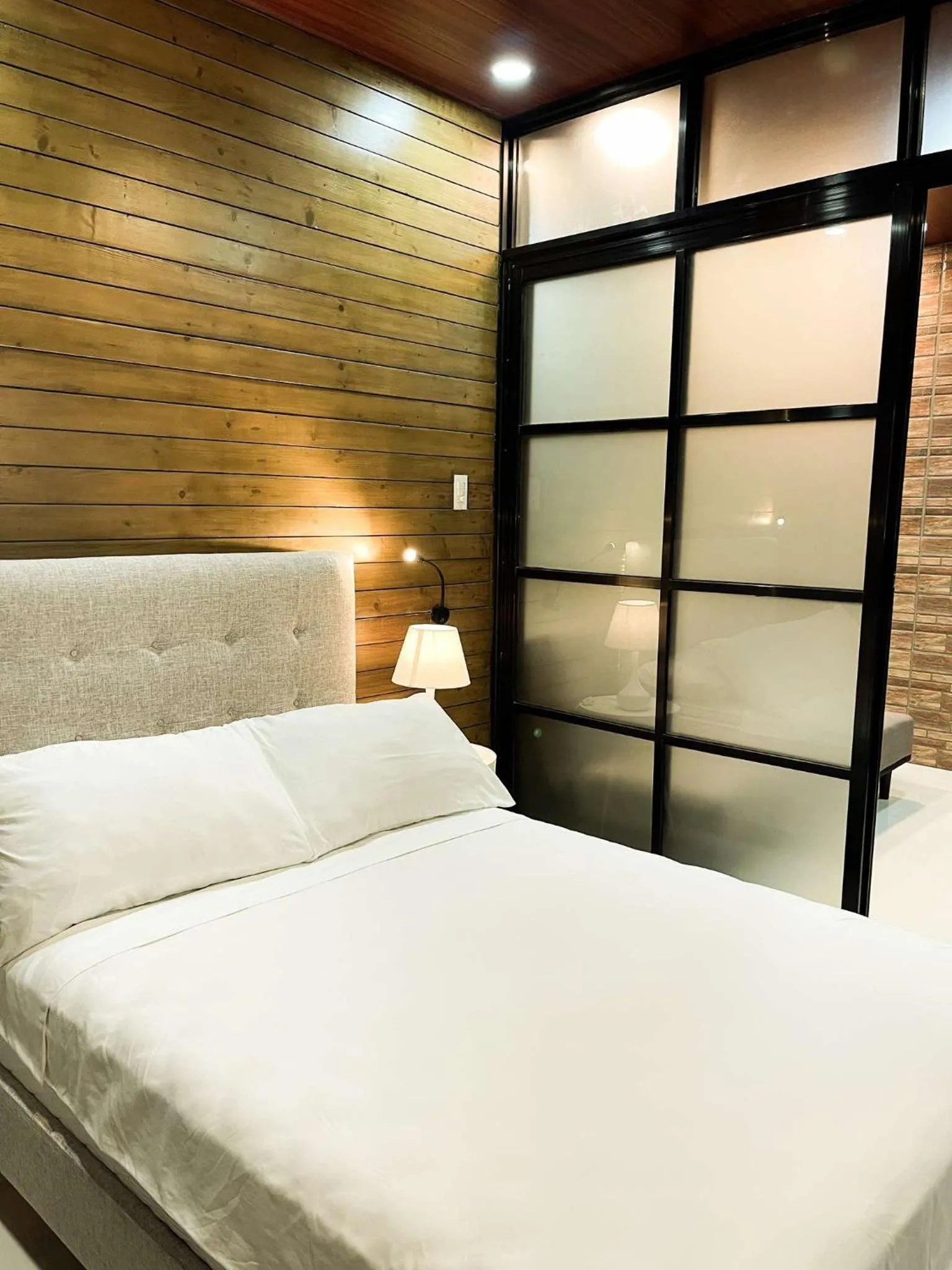 Bed in Cozy Pine Suites