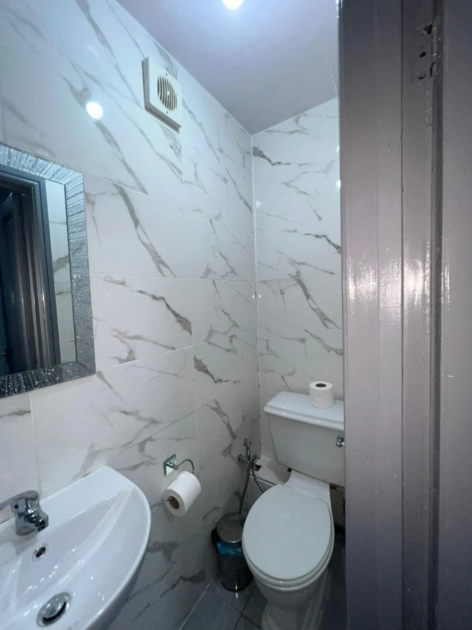 Bathroom in OYO Greenway Stays