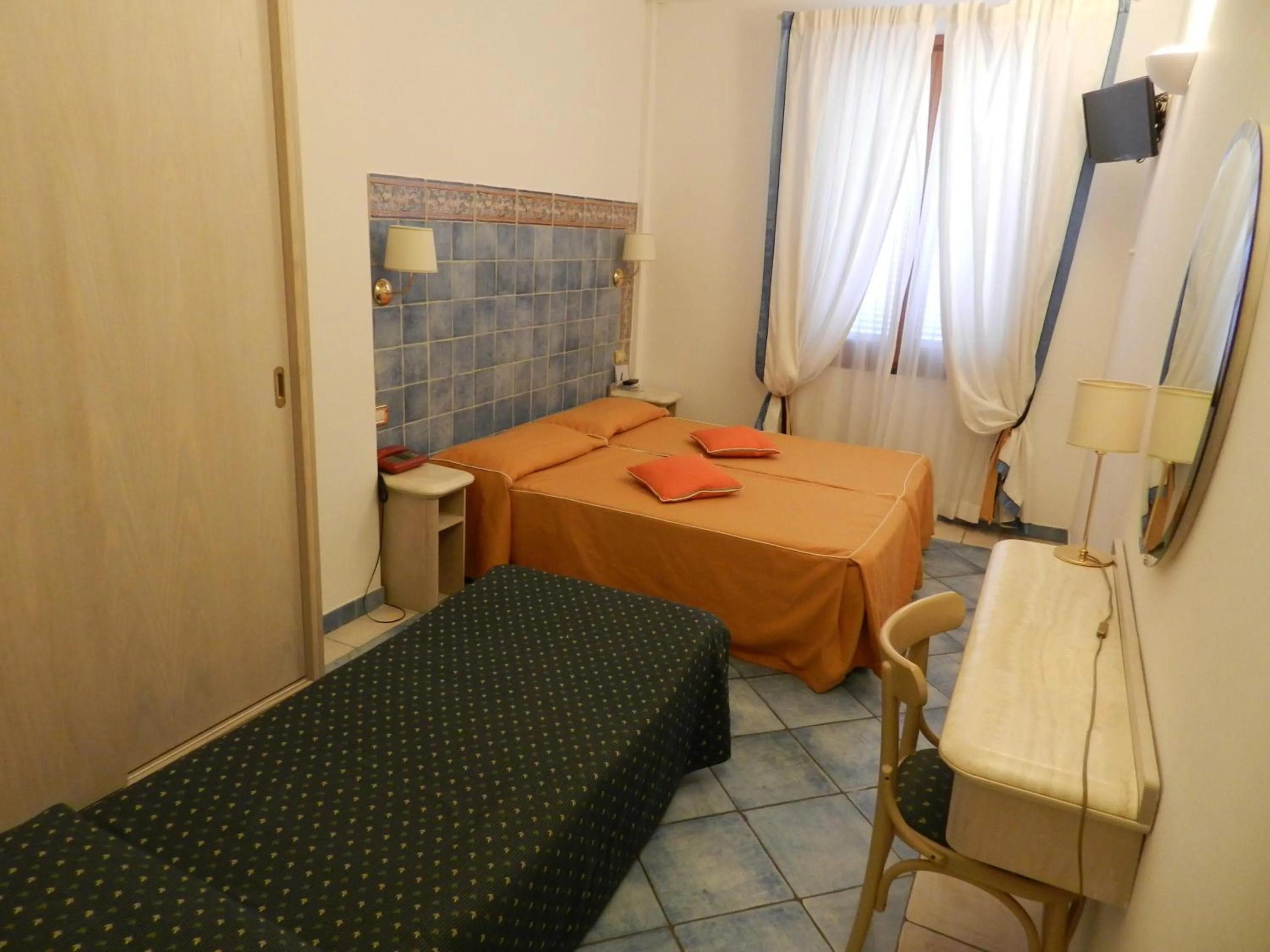 Decorative detail, Bed in Hotel Punta Mesco