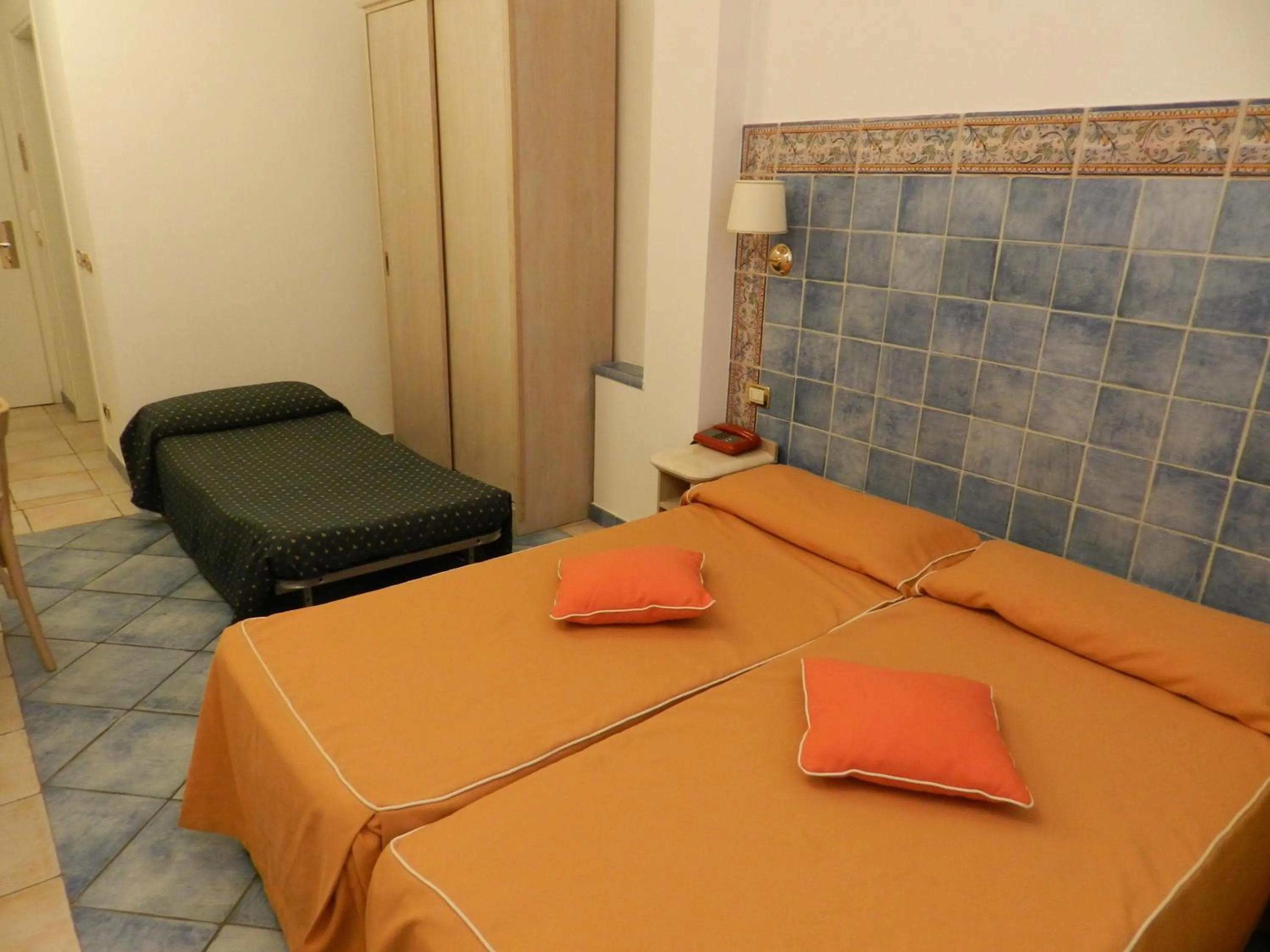 Decorative detail, Bed in Hotel Punta Mesco