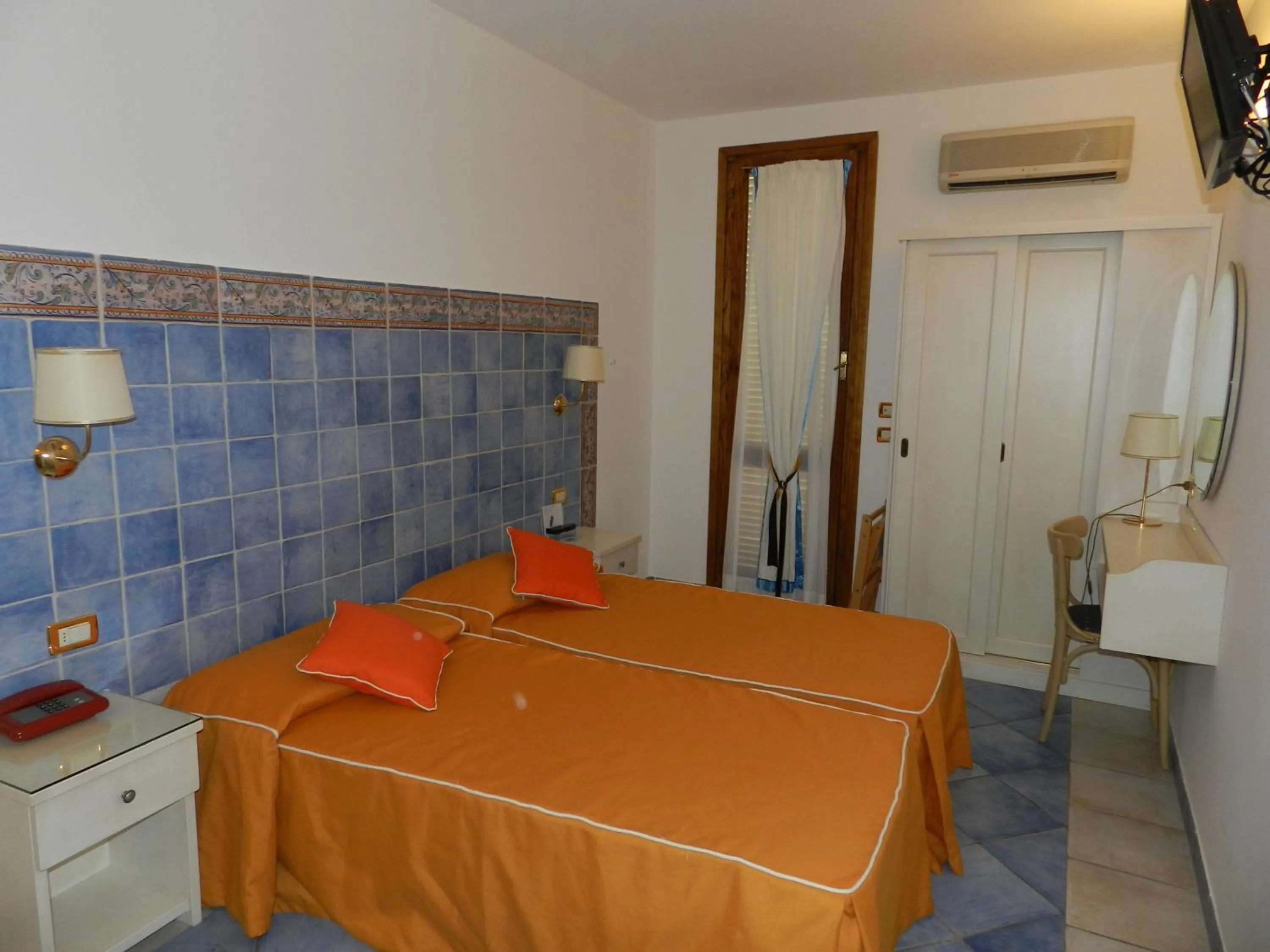 Decorative detail, Bed in Hotel Punta Mesco