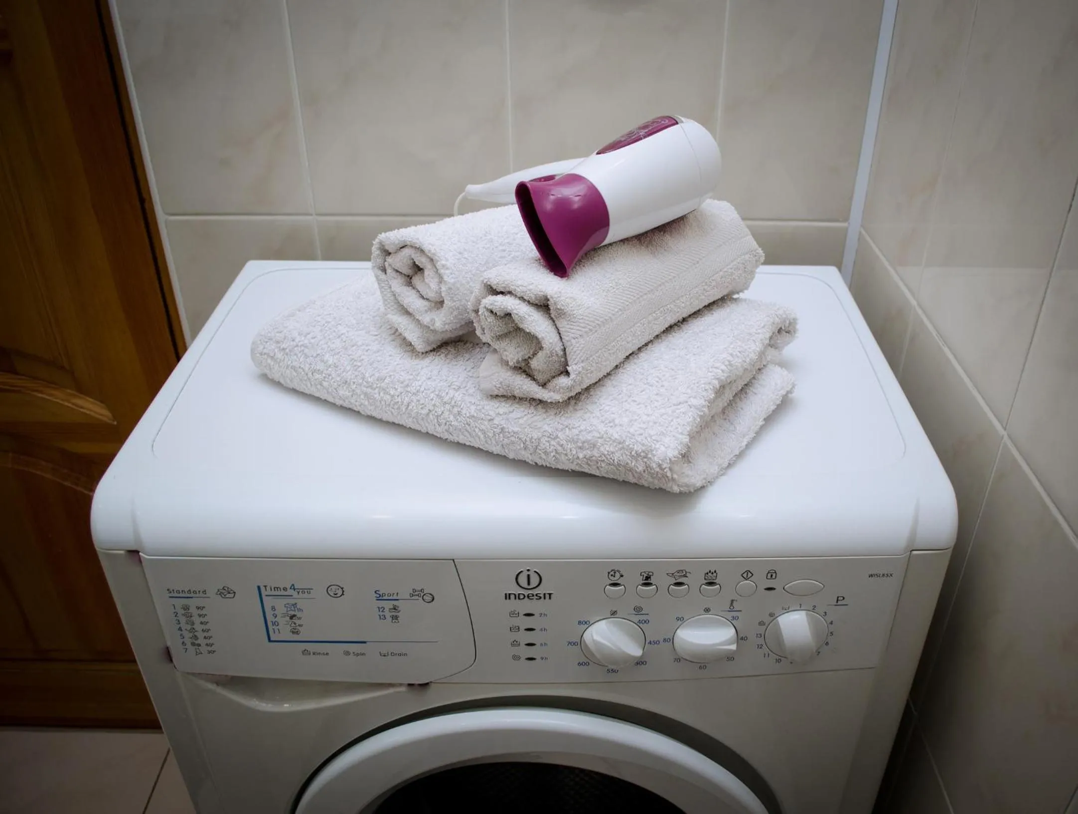 washing machine in Babylon Apartments
