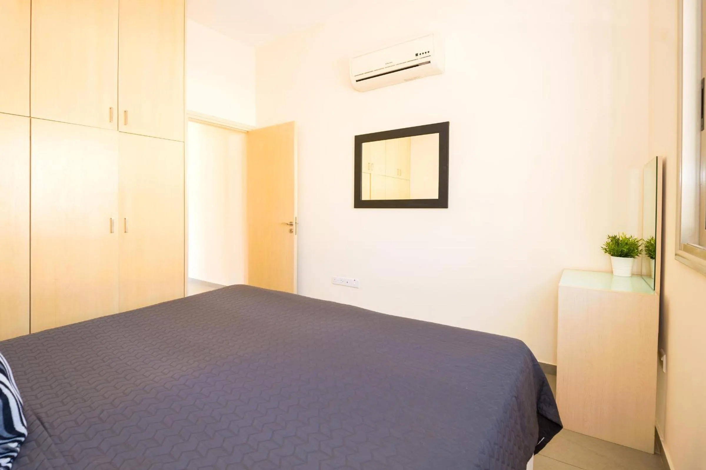 Bed in Bowker Apartment