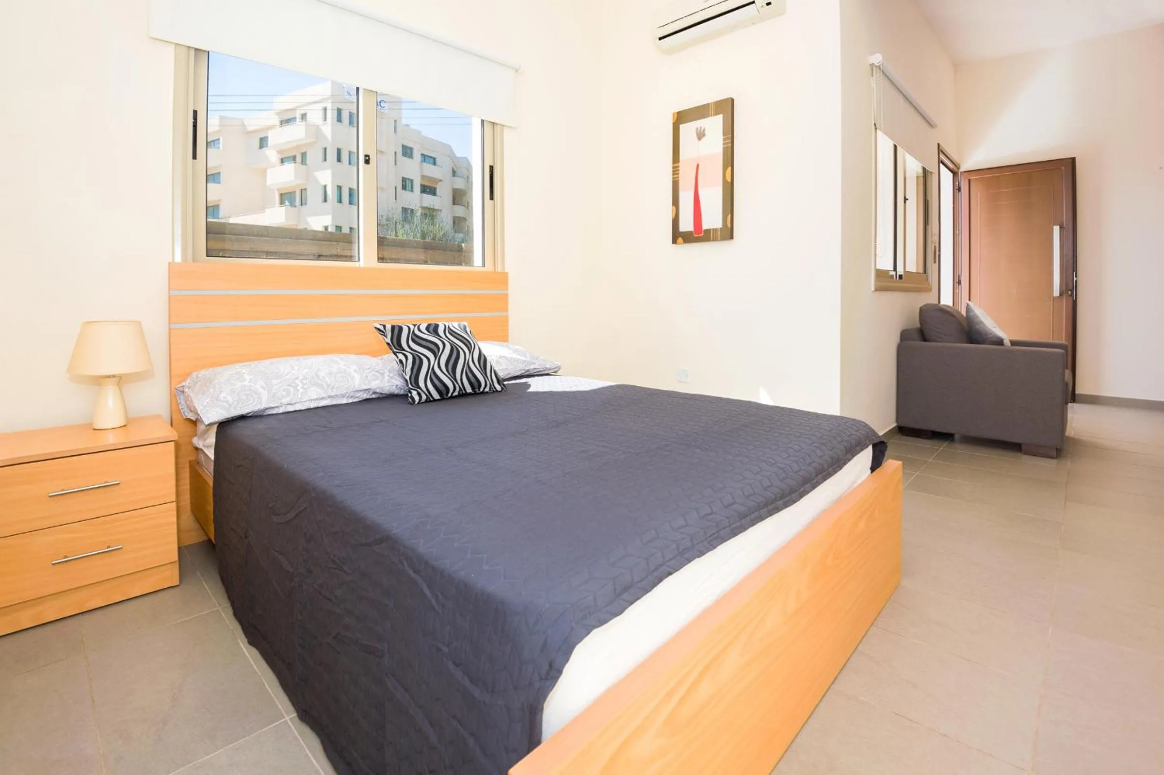 Bed in Bowker Apartment