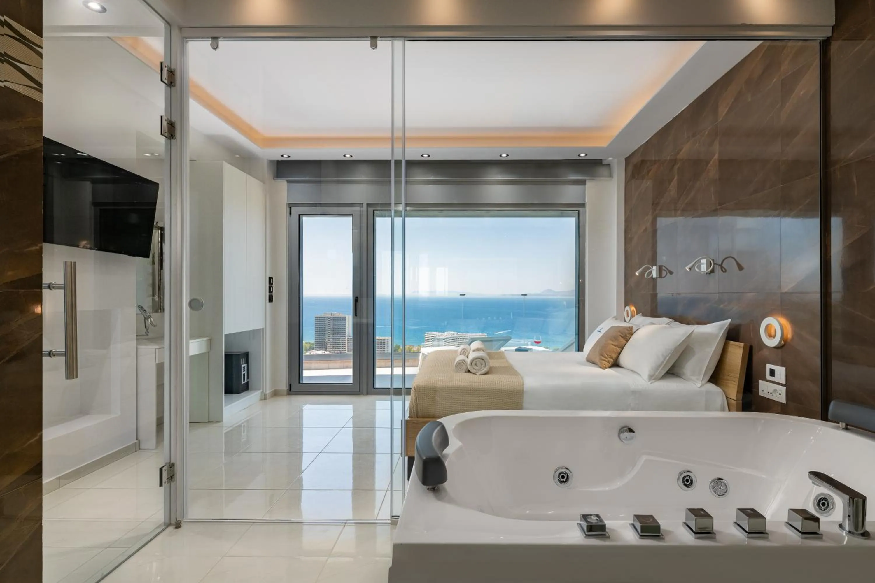 Shower, Bed in Rhodes Skyline Suite with out Door Jacuzzi Sea View A2