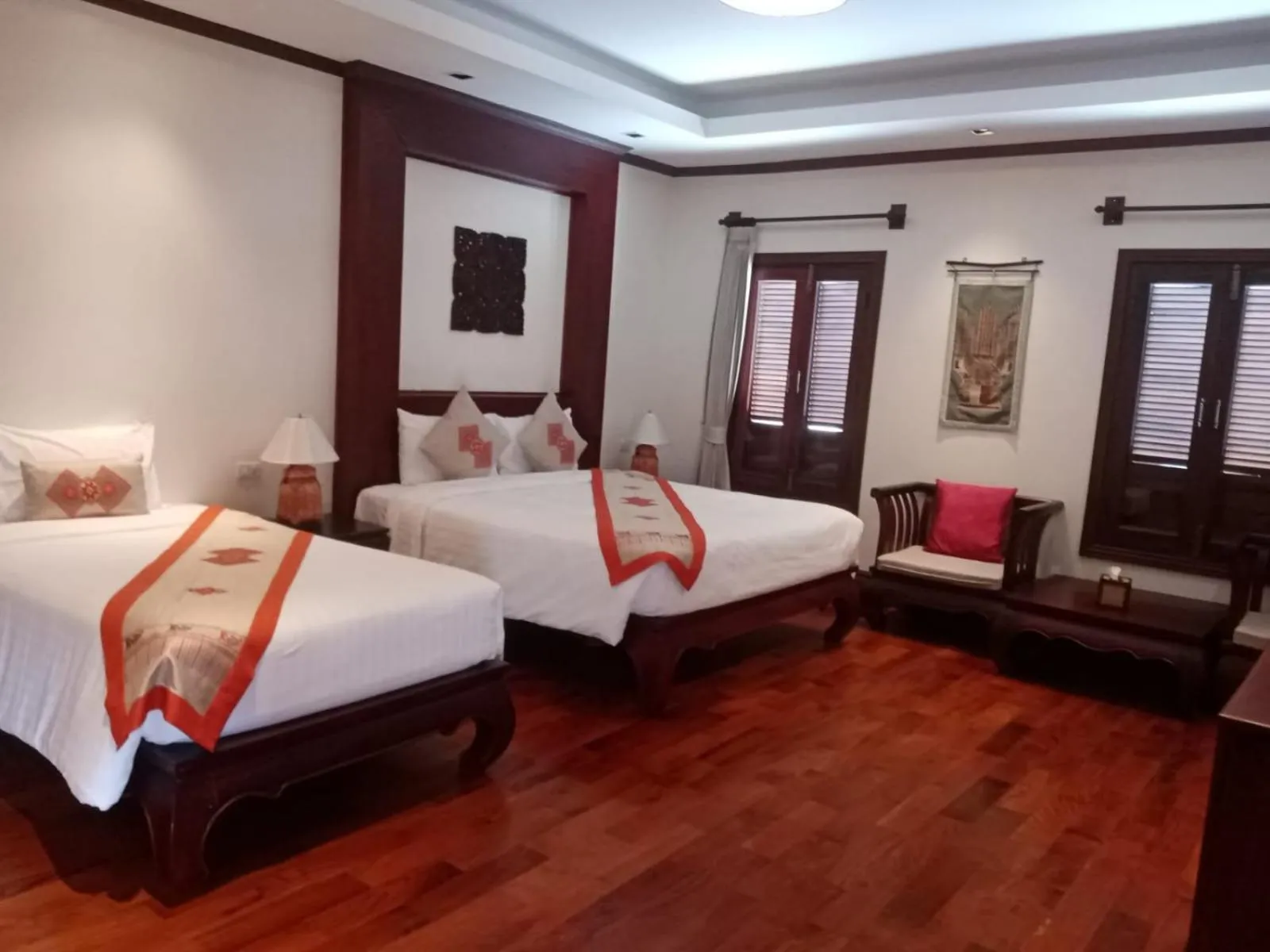 Bed in Houngvilai Hotel