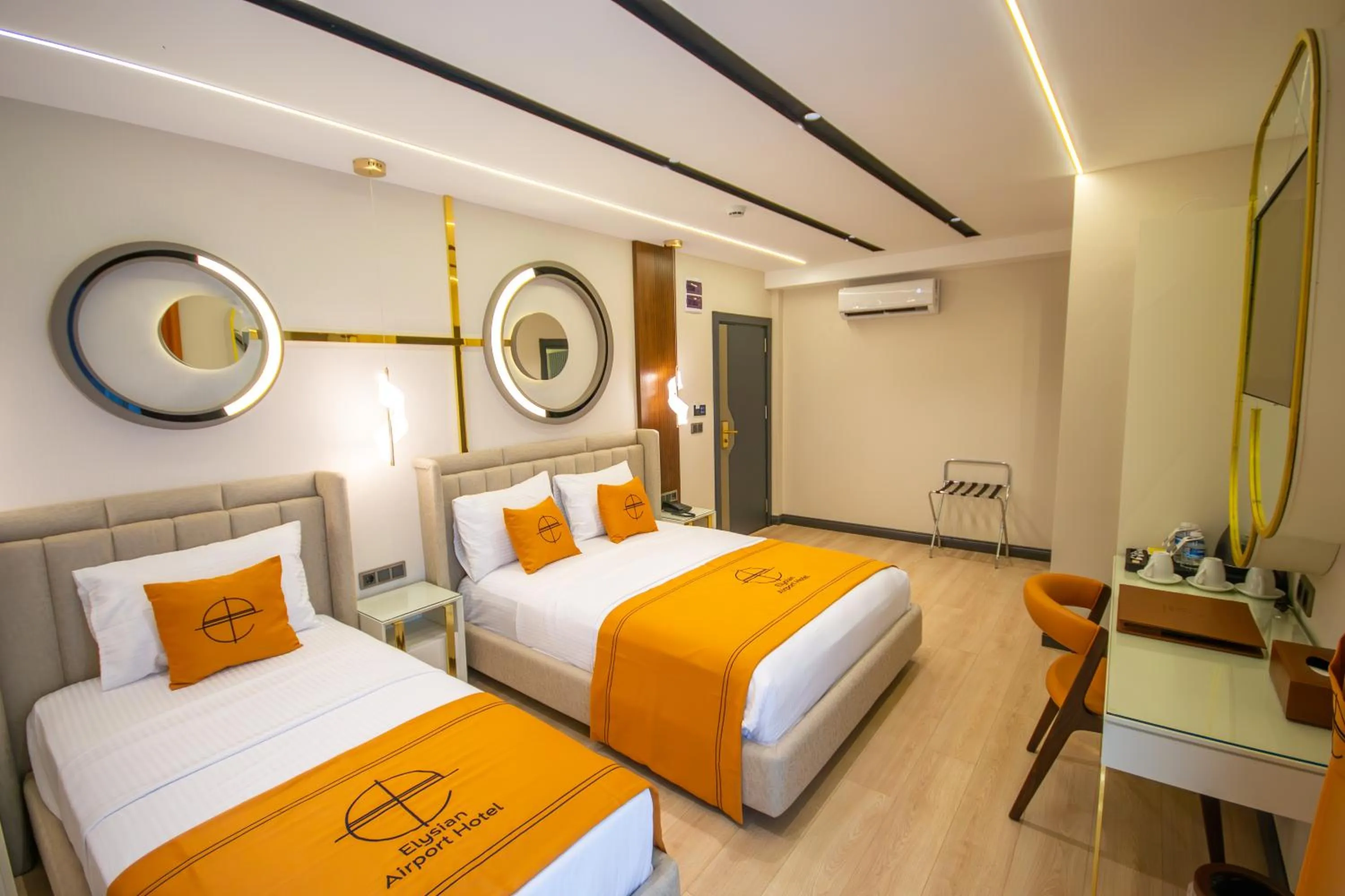 Bed in Elysian Airport Hotel & Restaurant