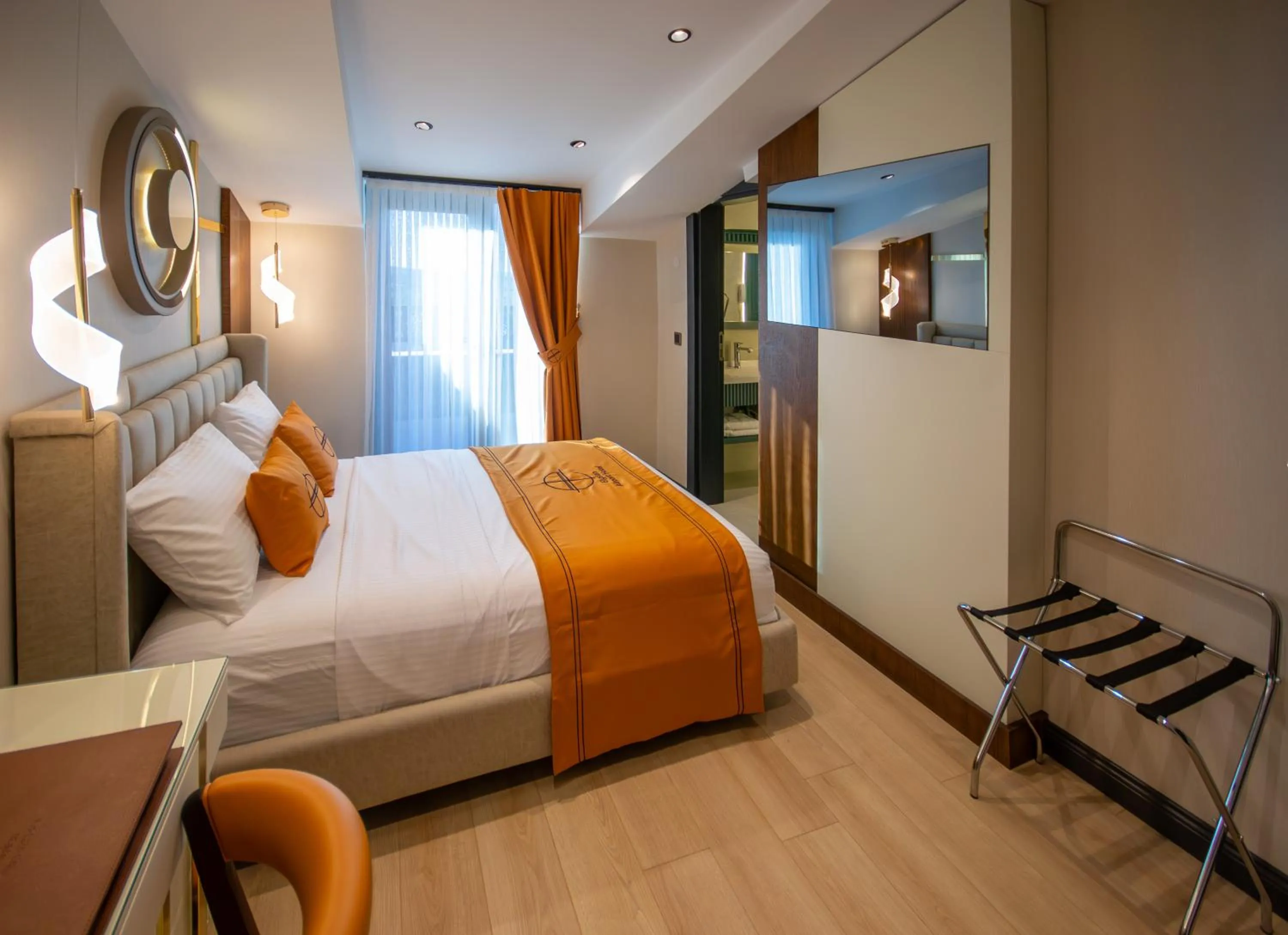 Bed in Elysian Airport Hotel & Restaurant