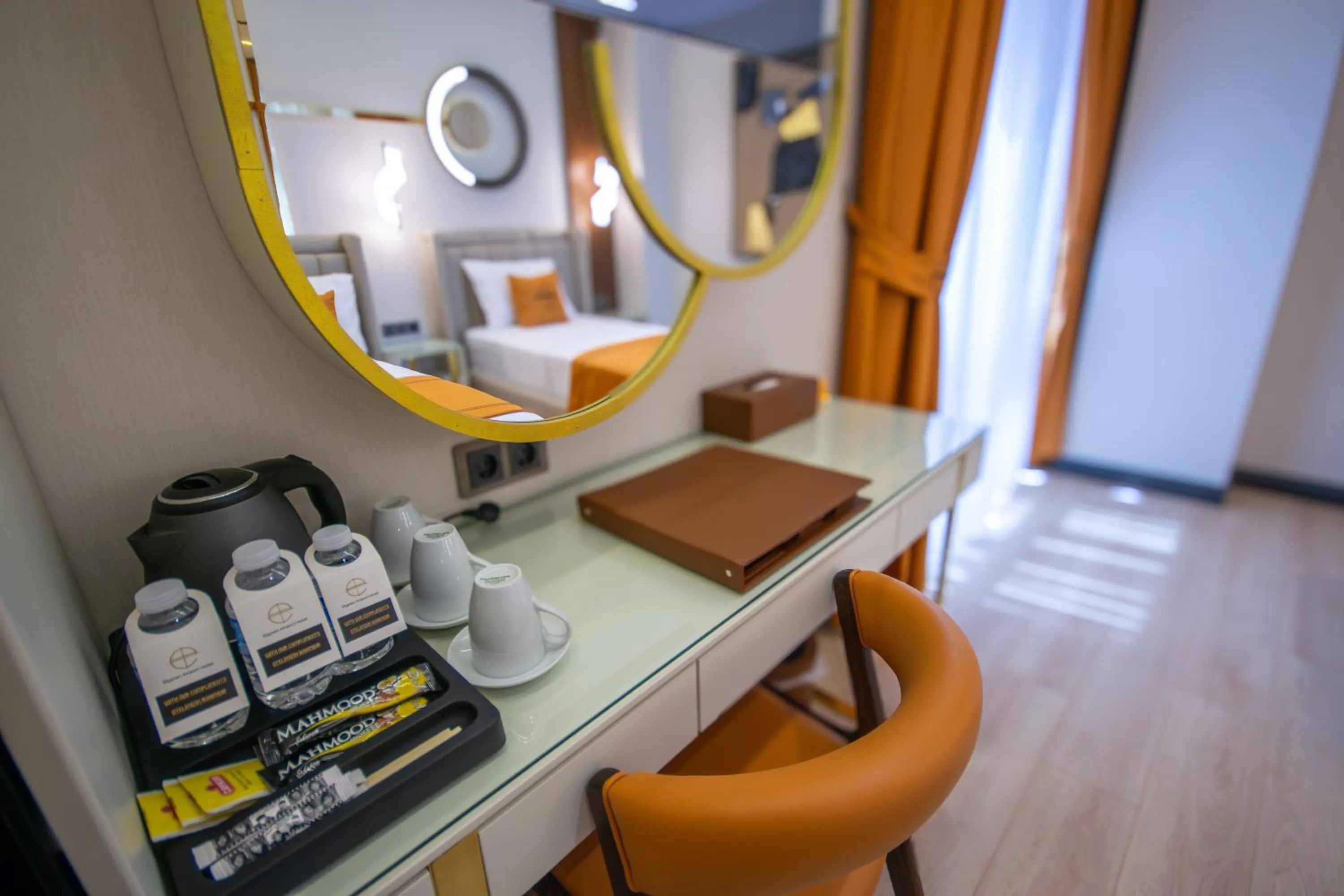 Bed in Elysian Airport Hotel & Restaurant