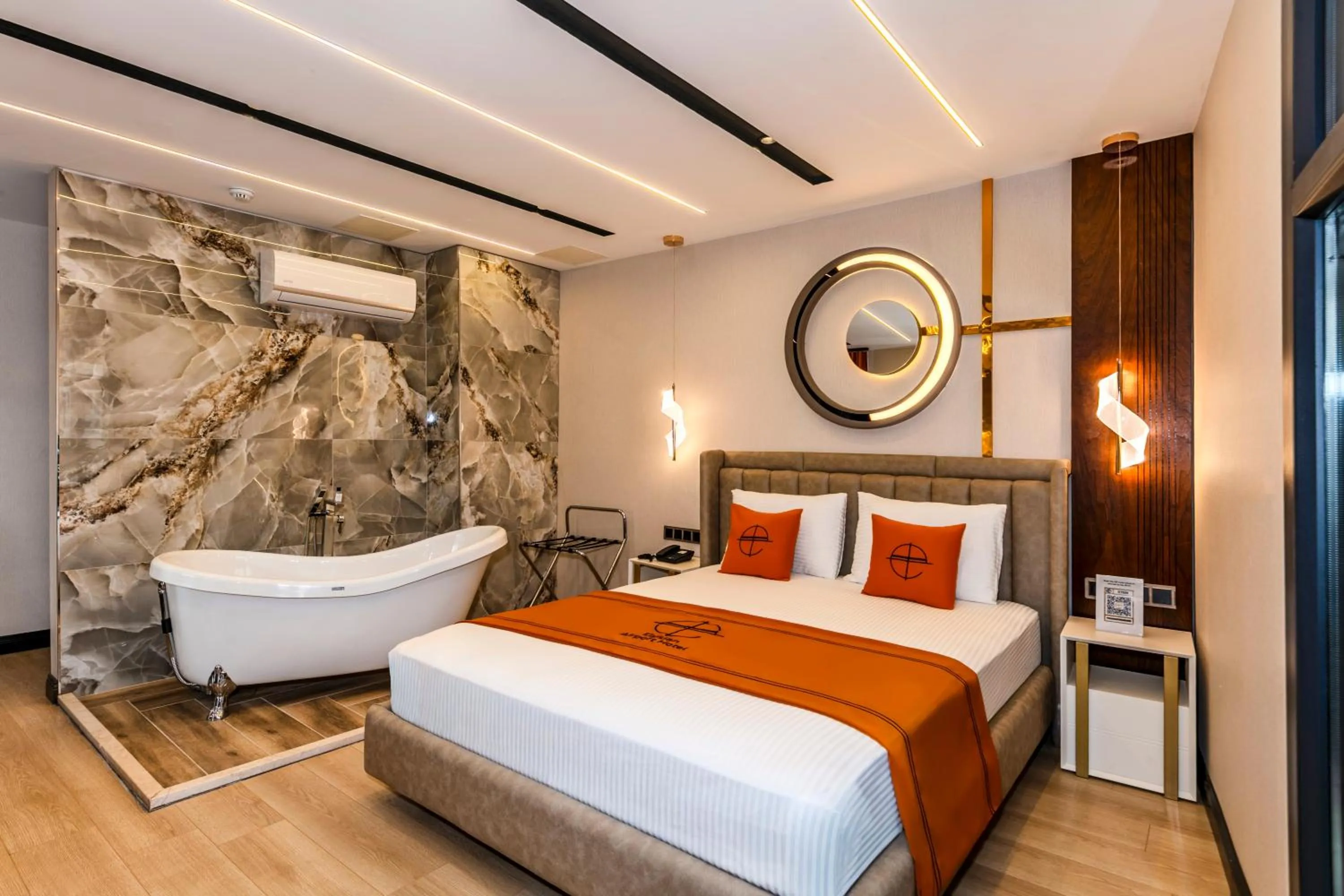 Bed in Elysian Airport Hotel & Restaurant