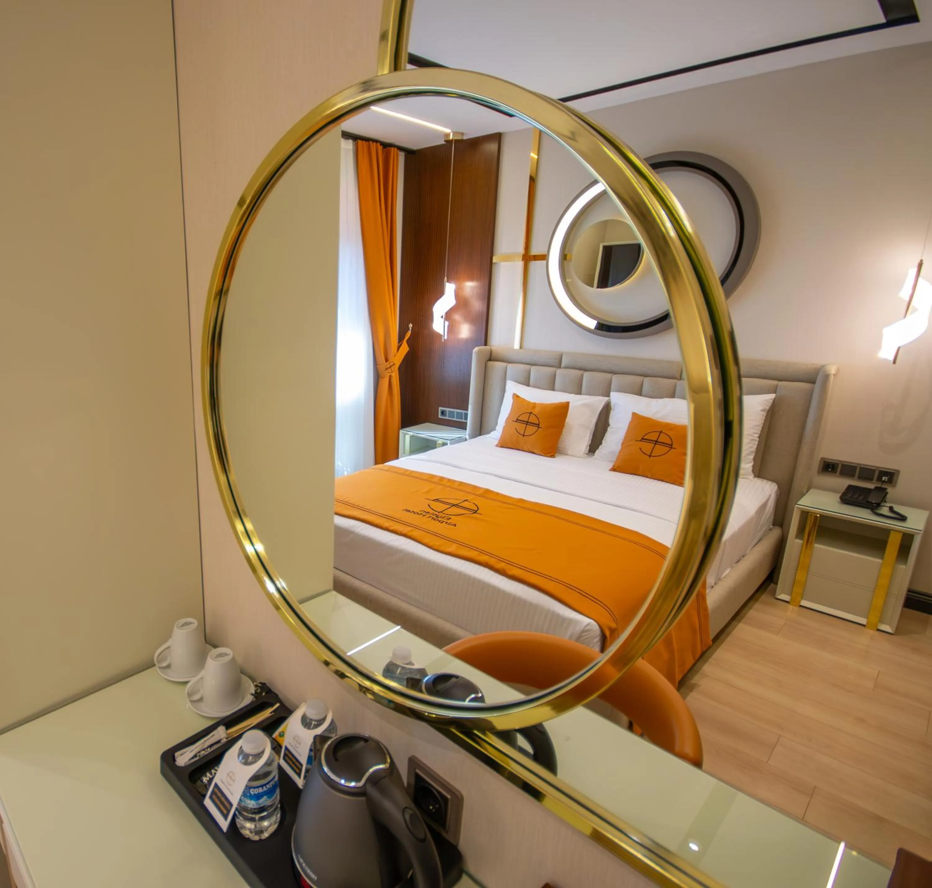 Bed in Elysian Airport Hotel & Restaurant