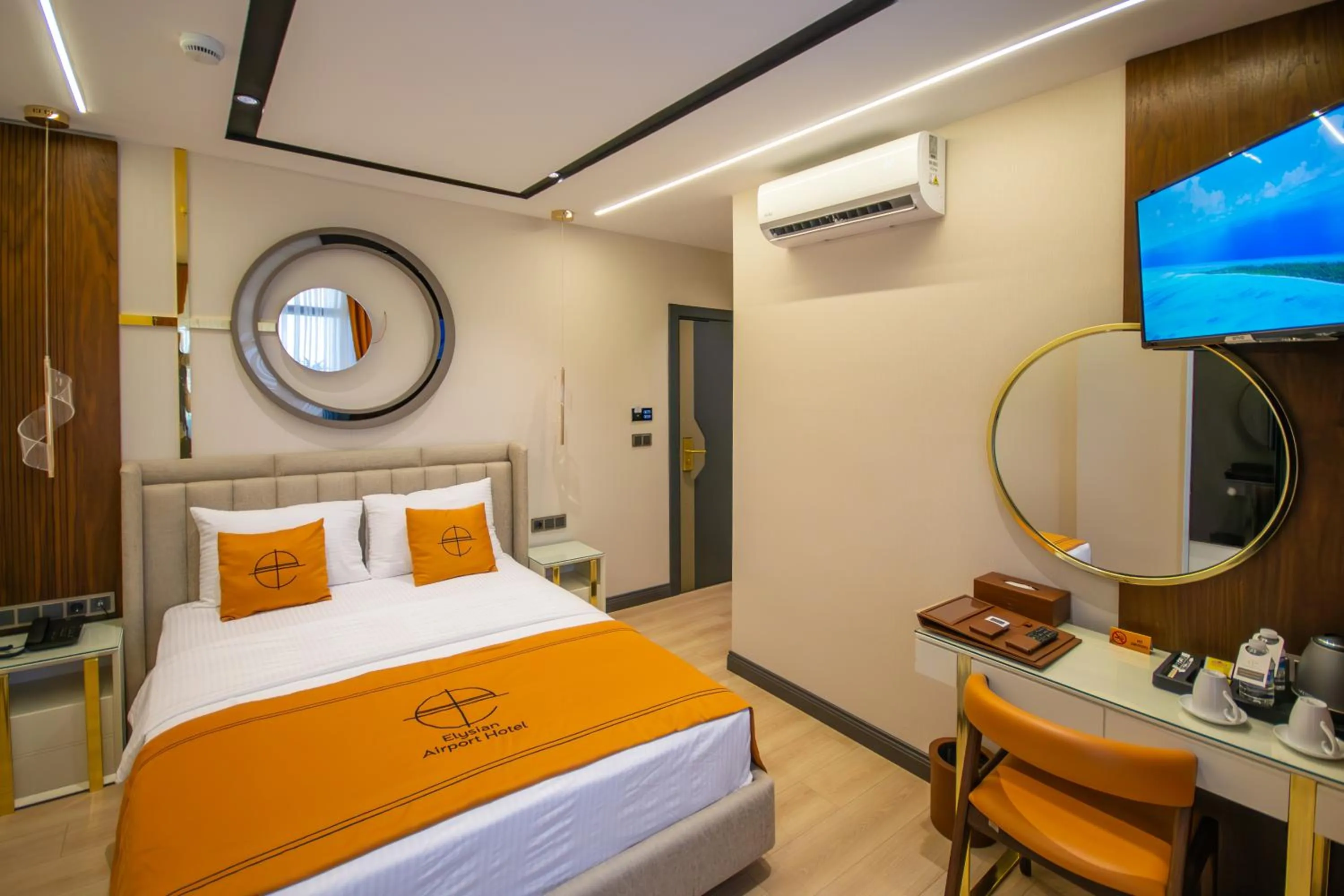 Bed in Elysian Airport Hotel & Restaurant