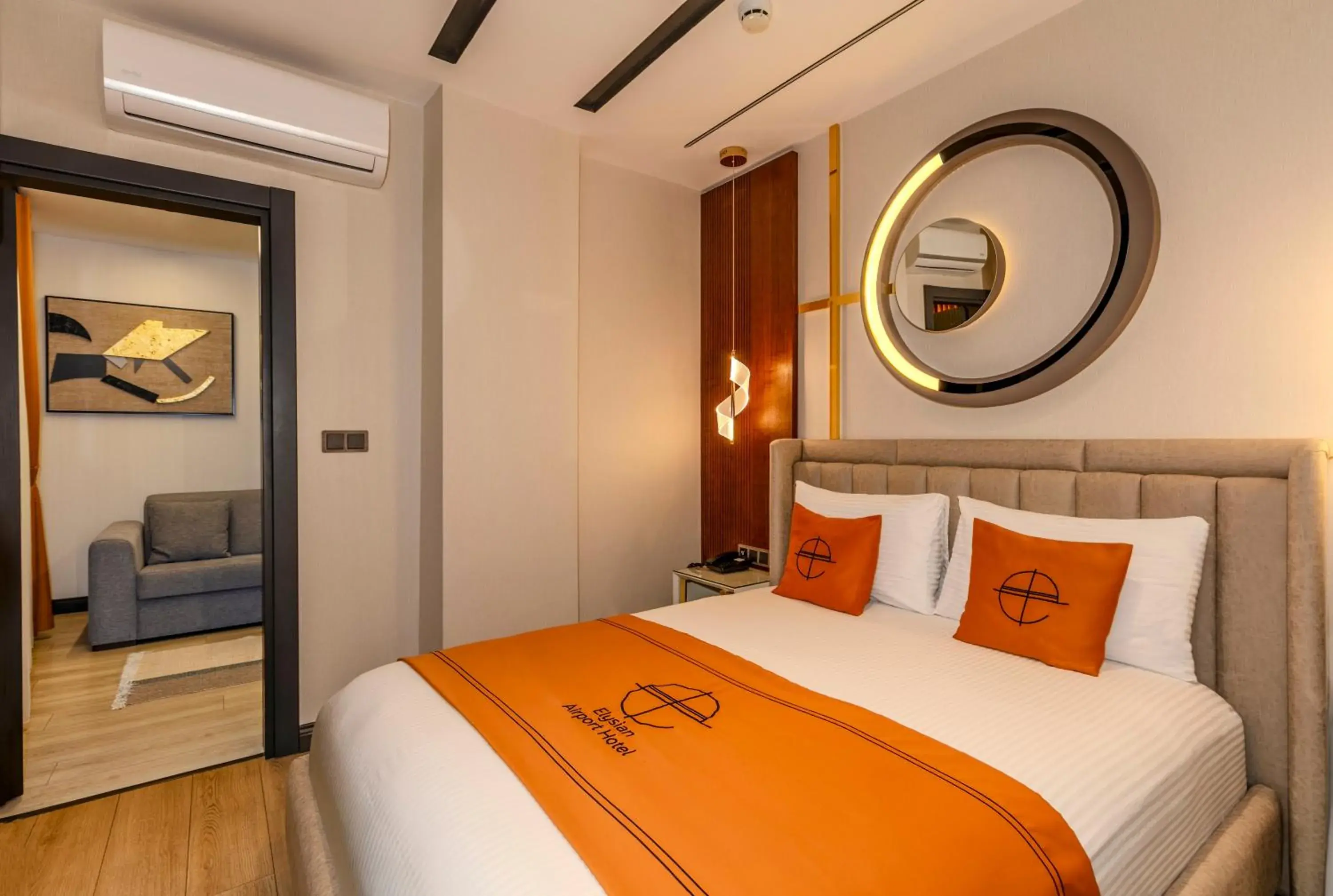 Living room, Bed in Elysian Airport Hotel & Restaurant Living room, Bed in Elysian Airport Hotel & Restaurant