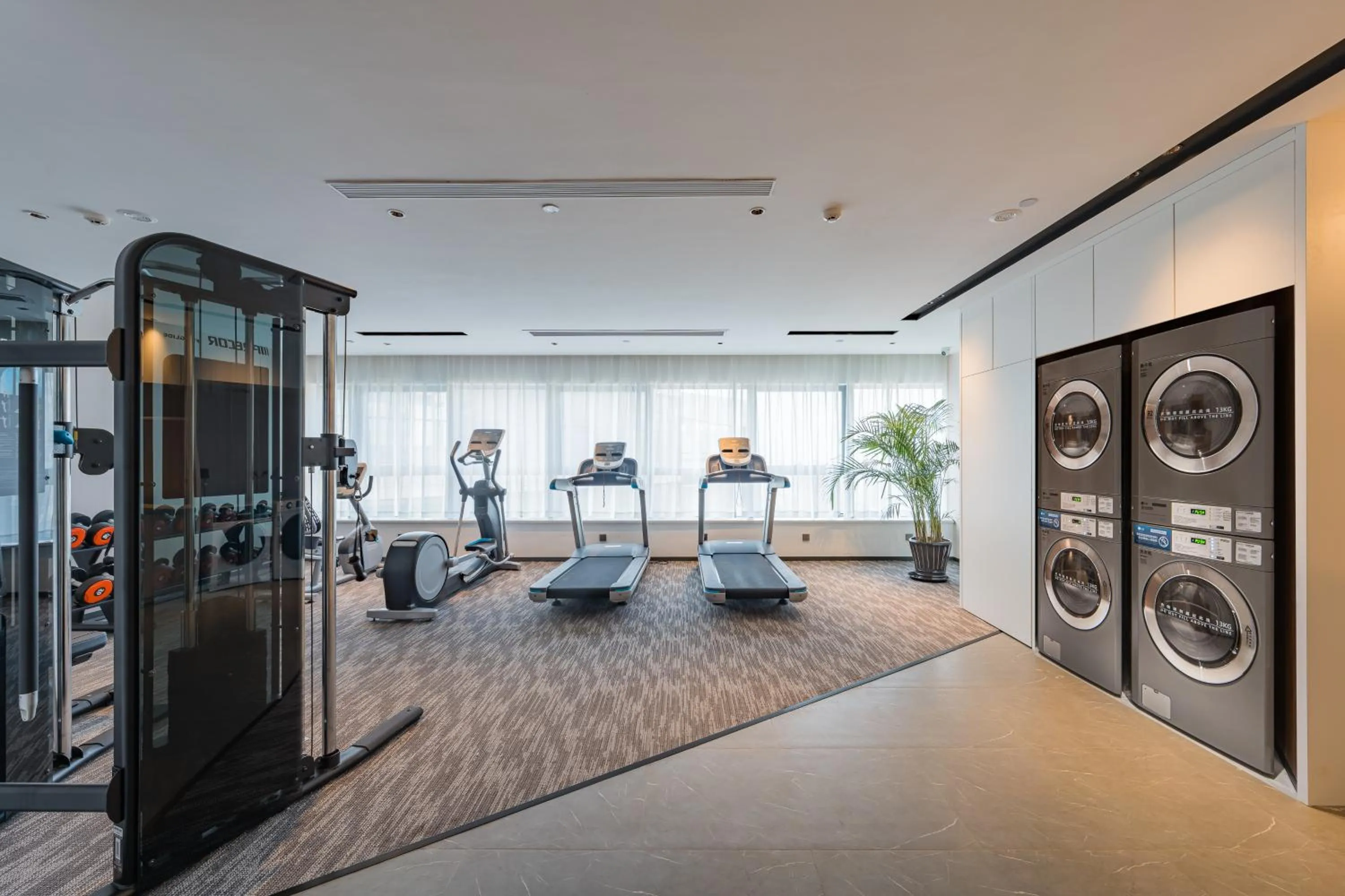 Fitness centre/facilities in UrCove by HYATT Hangzhou Riverside CBD