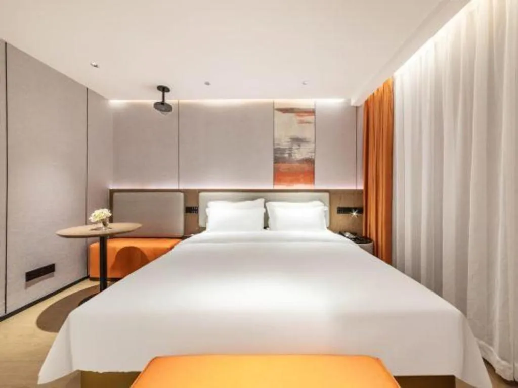 Bed in Yian Business Hotel