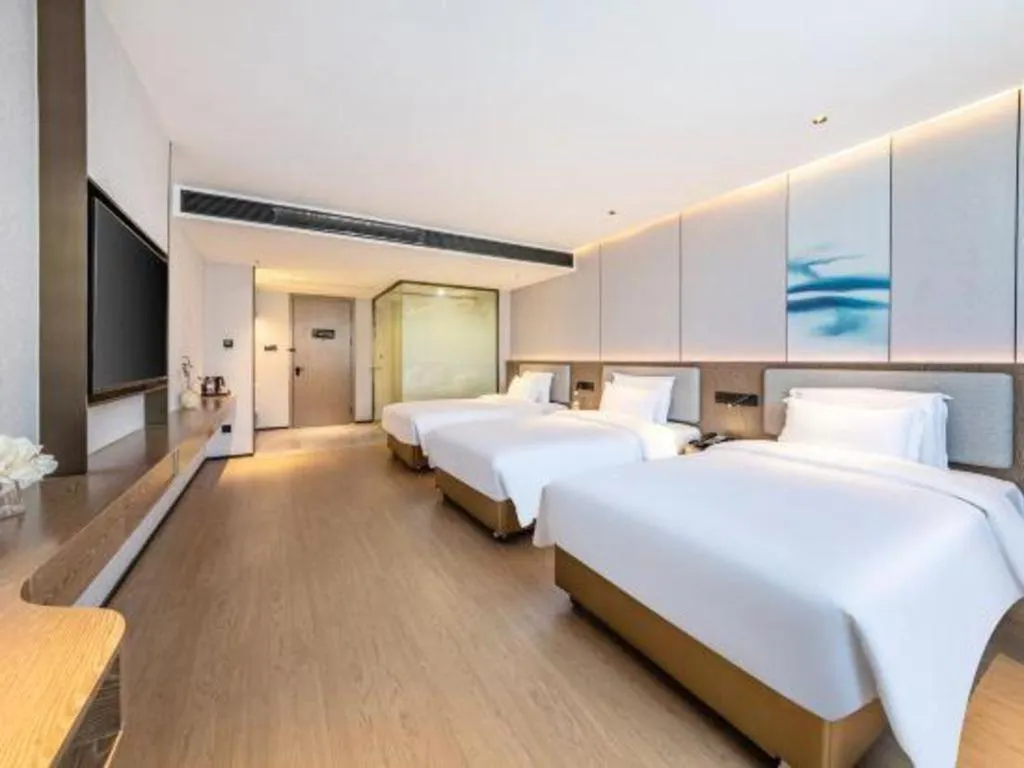 Bed in Yian Business Hotel