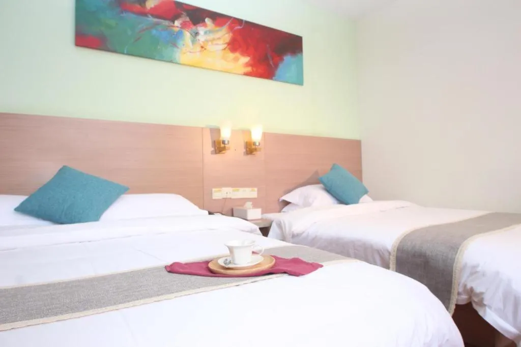 Bed in Yian Business Hotel