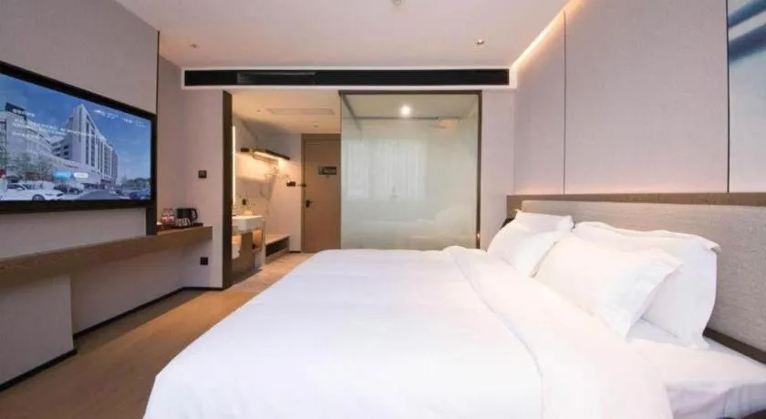 Bed in Yian Business Hotel