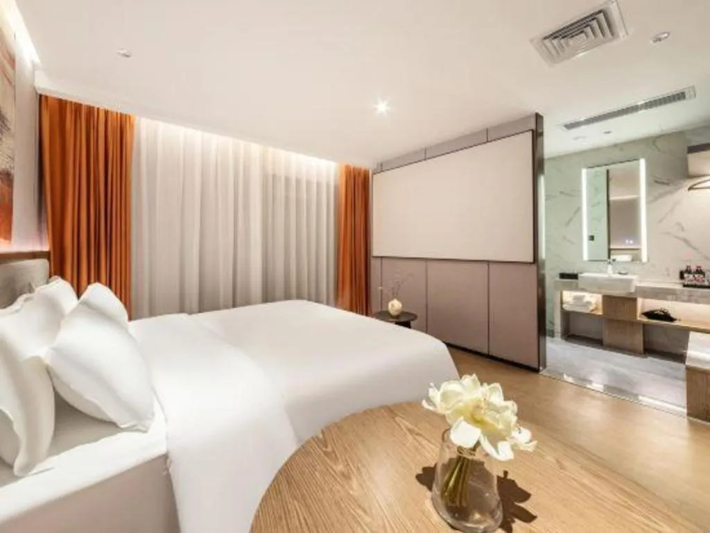 Bed in Yian Business Hotel