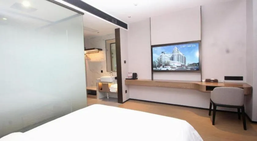 Bed in Yian Business Hotel