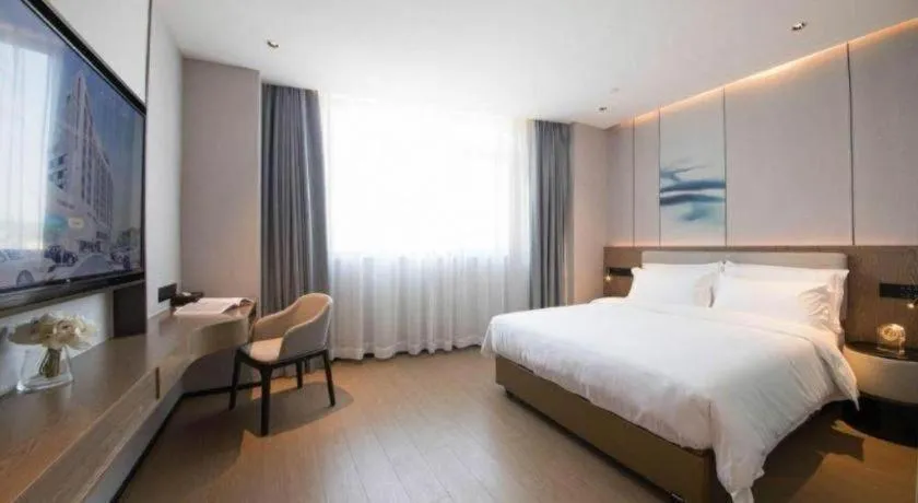 Bed in Yian Business Hotel