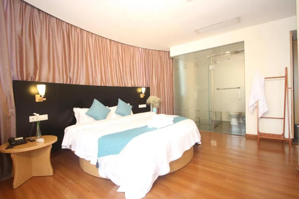 Bed in Yian Business Hotel