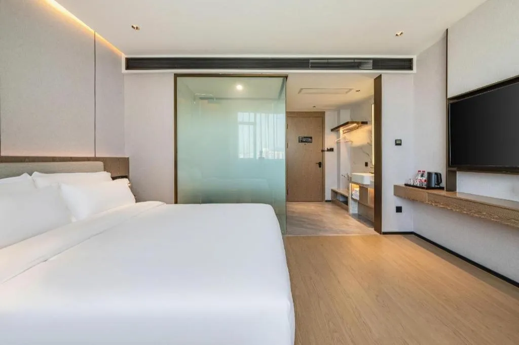 Bed in Yian Business Hotel